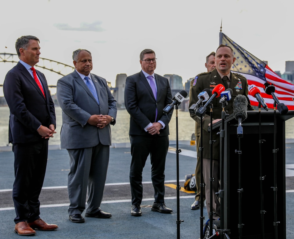 Maj. General Jered Helwig, , commanding general of the 8th Theater Sustainment Command, gives remarks during the opening ceremony of Talisman Sabre 2023 aboard the HMAS Canberra in Sydney Australia, July, 21, 2023. Talisman Sabre is a large-scale, bilateral military exercise between Australia and the United States, which strengthens relationships and interoperability among key allies and enhances collective capabilities to respond to a wide array of potential security concerns. This exercise will be the tenth iteration of the exercise. (US Army National Guard photo by Sgt. First Class Alexa Brumfield)