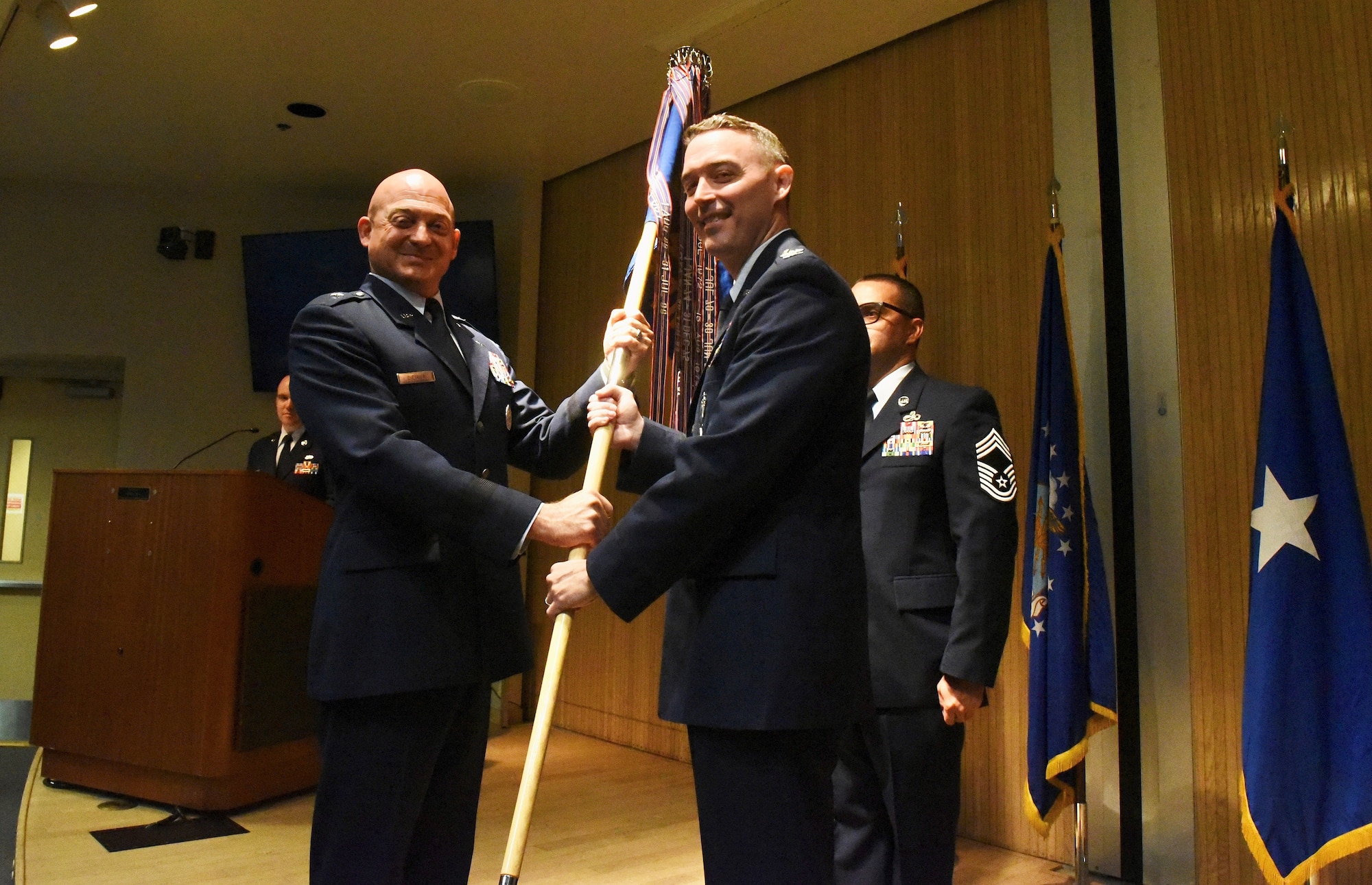 Col. Grant Fowler (right) takes command of the 982nd Training Group from Brig. Gen. George Dietrich III, 82nd Training Wing and Sheppard Air Force Base commander, during the 982d TRG change of command ceremony at Sheppard Air Force Base, Texas, July 20. The 982d TRG has more than 1,200 people assigned within two training squadrons and a newly reactivated training support squadron. U.S. Air Force photo by Bailee Russell