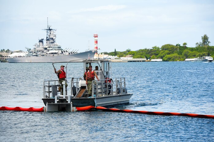 Joint Task Force-Red Hill (JTF-RH) and spill response personnel perform and observe a spill response exercise on Joint Base Pearl Harbor-Hickam, Hawaii, July 13, 2023. This exercise is mandated by the Hawaii Department of Health emergency state order and the U.S. Environmental Protection Agency 2023 Consent Order. Joint Task Force-Red Hill’s (JTF-RH) Response Directorate’s purpose is to protect the aquifer and environment by analyzing spill scenarios and developing appropriate mitigation measures. JTF-RH is committed to working with all relevant government agencies to ensure Red Hill is defueled safely, expeditiously, and in compliance with all federal, state and local laws, policies and regulations. (DoD photo by Cpl. Gabrielle Zagorski)