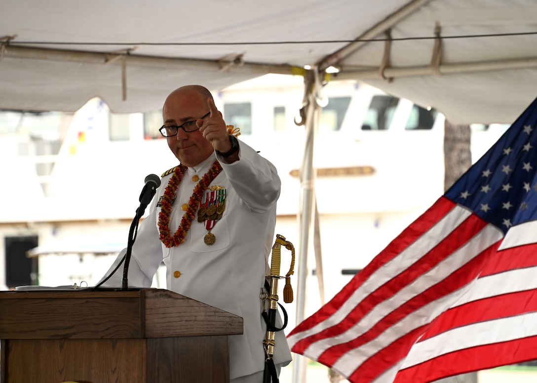 Capt. Tom D’Arcy recognizes the U.S. Coast Guard Cutter Kimball’s (WMSL 756) crew for their accomplishments, dedication and hard work during his two years as the cutter’s commanding officer during the Kimball’s change of command ceremony on Base Honolulu, July 21, 2023. Rear Adm. Brendan C. McPherson, deputy commander of U.S. Coast Guard Pacific Area, presided over the ceremony in which Capt. Bob Kinsey relieved D’Arcy as Kimball’s commanding officer. U.S. Coast Guard photo by Chief Petty Officer Matthew Masaschi.