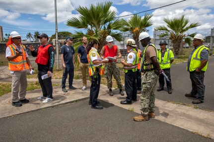 Joint Task Force-Red Hill (JTF-RH) personnel and stakeholder representatives discuss response actions during a spill response exercise on Joint Base Pearl Harbor-Hickam, Hawaii, June 8, 2023. This exercise is mandated by the DOH emergency state order and the EPA 2023 Consent Order. JTF-RH Response Directorate’s purpose is to protect the aquifer and environment by analyzing every possible spill scenario and developing appropriate mitigation measures. JTF-RH is committed to working with all local, state, and government agencies to ensure Red Hill is defueled safely, expeditiously, and in compliance with all federal, state and local laws, policies and regulations. (DoD photo by U.S. Army Spc. Matthew Mackintosh)