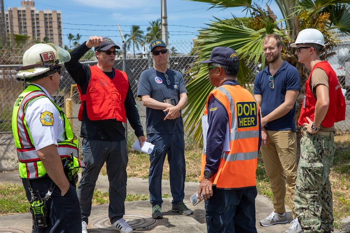Joint Task Force-Red Hill (JTF-RH) personnel and stakeholder representatives discuss initial steps during a spill response exercise on Joint Base Pearl Harbor-Hickam, Hawaii, June 8, 2023. This exercise is mandated by the DOH emergency state order and the EPA 2023 Consent Order. JTF-RH Response Directorate’s purpose is to protect the aquifer and environment by analyzing every possible spill scenario and developing appropriate mitigation measures. JTF-RH is committed to working with all local, state, and government agencies to ensure Red Hill is defueled safely, expeditiously, and in compliance with all federal, state and local laws, policies and regulations. (DoD photo by U.S. Army Spc. Matthew Mackintosh)