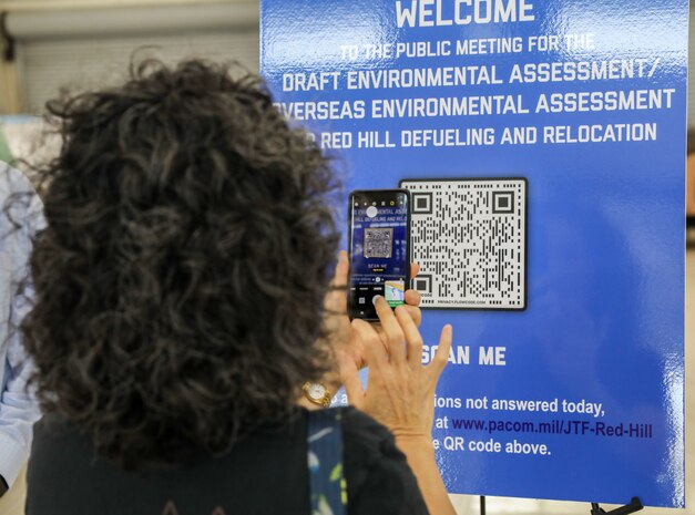 A local resident scans a QR code linking to the Red Hill Draft Environmental Assessment/Overseas Environmental Assessment (EA/OEA) at Joint Task Force-Red Hill’s (JTF-RH) National Environmental Policy Act (NEPA) Public Meeting at Ke’ehi Lagoon Memorial, Honolulu, Hawaii, June 15, 2023. JTF-RH hosted the public meeting to provide the public with information regarding the NEPA Draft EA/OEA, accept comments, and an opportunity for the public to engage directly with subject matter experts. JTF-RH is in phase three of its five-phase defueling plan. Personnel are focused on completing repairs, quality control tasks, training, response preparation, the NEPA Environmental Assessment, regulatory approvals and operational planning for all major milestones. This extensive preparatory work will help ensure the safe and expeditious defueling of the Red Hill Bulk Fuel Storage Facility. (DoD photo by U.S. Army Sgt. Kyler Chatman)