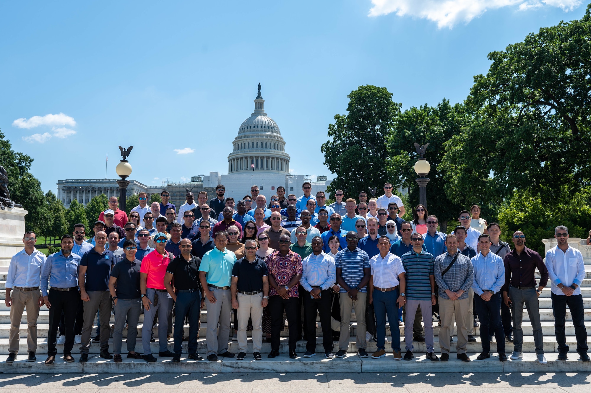 Air Command and Staff College international officers representing 64 nations, pose outside the U.S. Capitol building July 12, 2023. Students from the International Officer School, a part of Air University, located at Maxwell AFB, Ala. garnered insight on how the U.S. government affects its citizens and people and nations across the globe. Additionally, the entire group met with Alabama representatives Terri Sewell, Dale Strong and Barry Moore to discuss the importance of alliances and partnerships in support of the National Security Strategy.