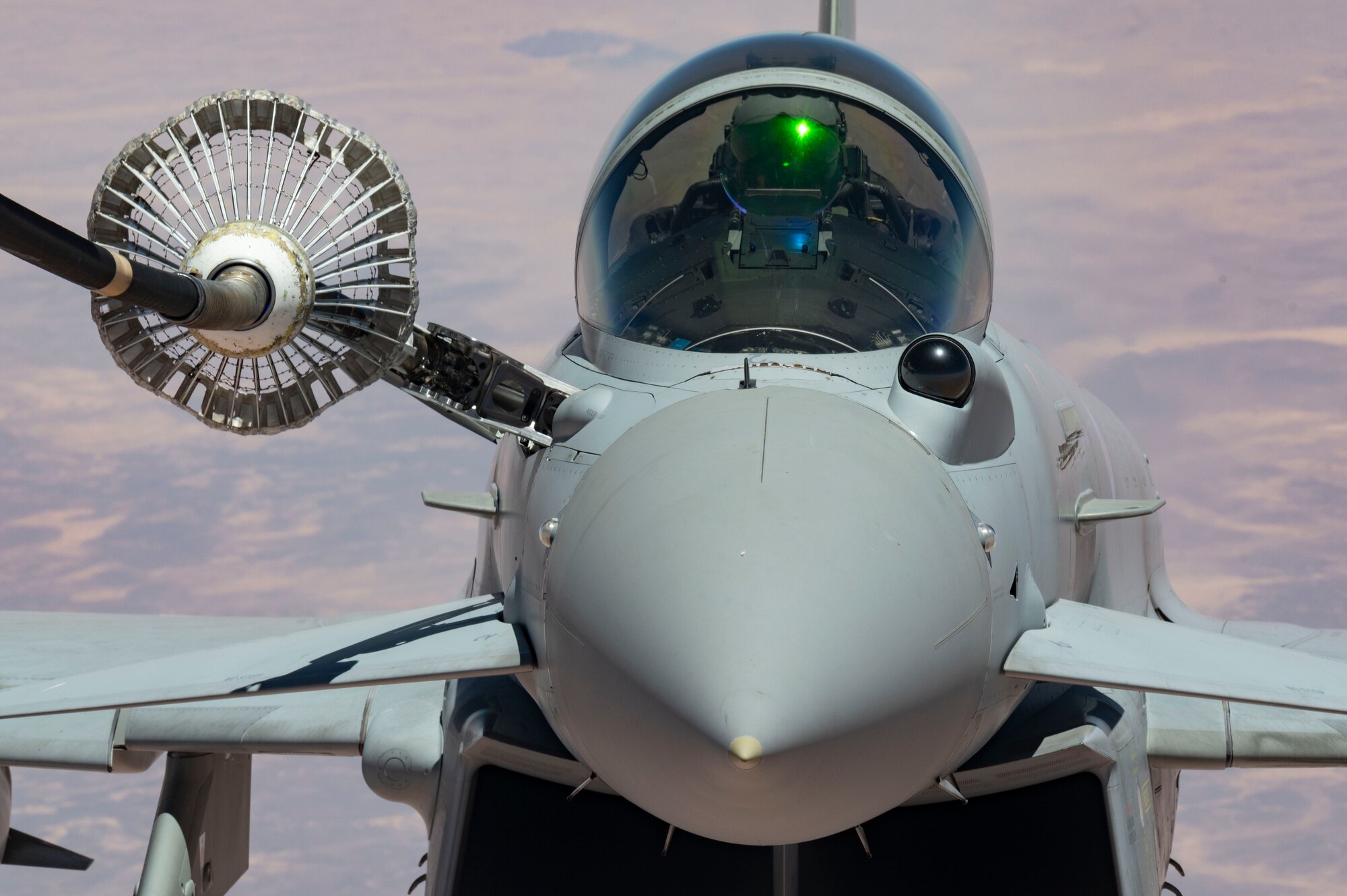 A Royal Air Force Eurofighter Typhoon FGR4 refuels from a KC-10 Extender assigned to the 908th Expeditionary Air Refueling Squadron during Yellow Sands, the Counter-Unmanned Aircraft Systems (C-UAS) exercise in Southwest Asia, July 20, 2023. The exercise aimed to ensure the safety of forces and the success of ongoing missions by enhancing the collective capacity to detect, track and neutralize UAS threats. (U.S. Air Force photo by Staff Sgt. Emily Farnsworth)