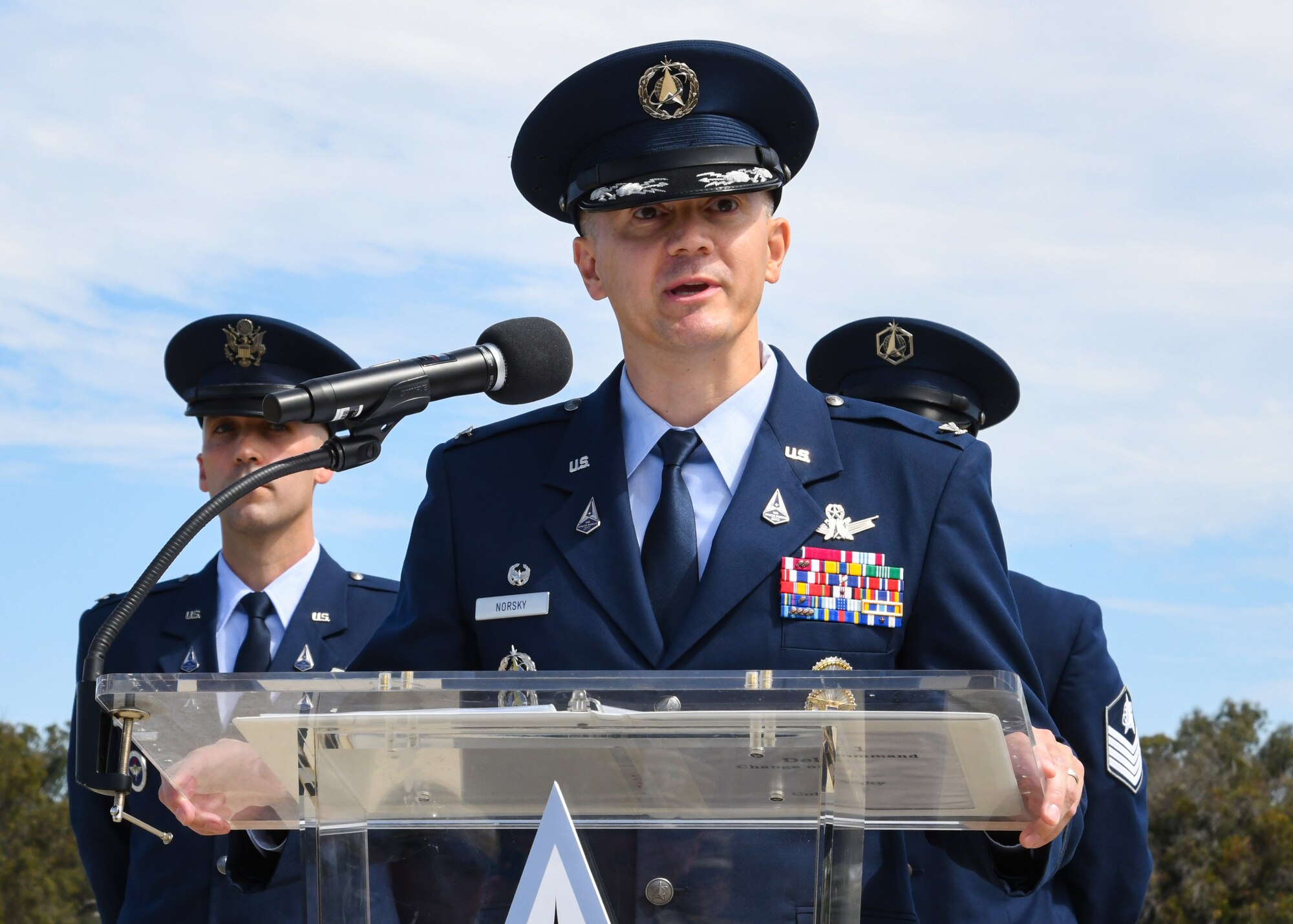 U.S. Space Force Col. Peter Norsky, incoming Delta 1 commander, delivers remarks during the Delta 1 change of command ceremony at Vandenberg Space Force Base, Calif., July 17, 2023. Space Force Col. Jason N. Schramm relinquished command to U.S. Space Force Col. Peter Norsky. U.S. Air Force Maj. Gen. Shawn N. Bratton, Space Training and Readiness Command commander, presided over the ceremony. (U.S. Space Force photo by Senior Airman Rocio Romo)