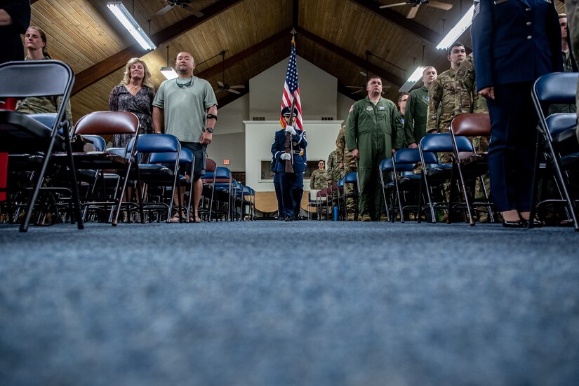 Honor Guard members from the 123rd Airlift Wing prepare to present the colors during a retirement ceremony for Col. David Flynn, director of air operations for Joint Force Headquarters—Kentucky, at the Kentucky Air National Guard Base in Louisville, Ky., May 20, 2023. Flynn is retiring after 28 years of military service. (U.S. Air National Guard photo by Tech. Sgt. Joshua Horton)