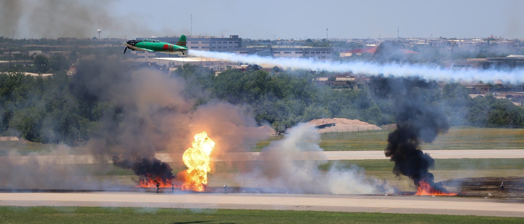 aircraft flys over fireball