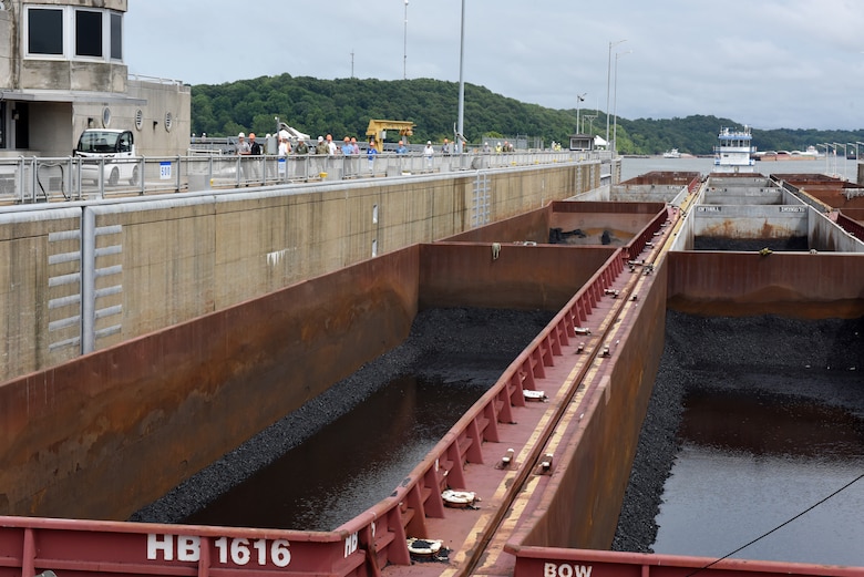 The Inland Waterways Users Board observes a lockage at Kentucky Lock July 19, 2023, while touring Kentucky Lock Addition Project on the Tennessee River in Grand Rivers, Kentucky. The U.S. Army Corps of Engineers Nashville District is constructing a larger lock at the Tennessee Valley Authority dam. (USACE Photo by Lee Roberts)