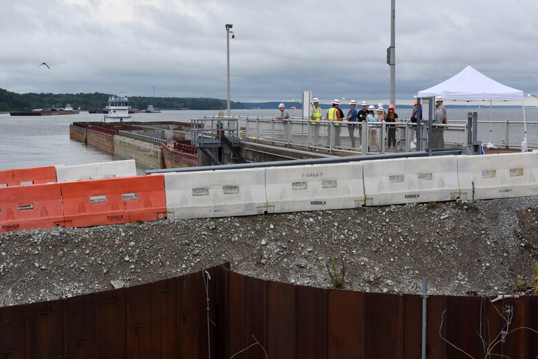 Officials receive a presentation July 19, 2023, about the remaining scope of work at the Kentucky Lock Addition Project on the Tennessee River in Grand Rivers, Kentucky. The U.S. Army Corps of Engineers Nashville District is constructing a larger lock at the Tennessee Valley Authority dam. (USACE Photo by Lee Roberts)