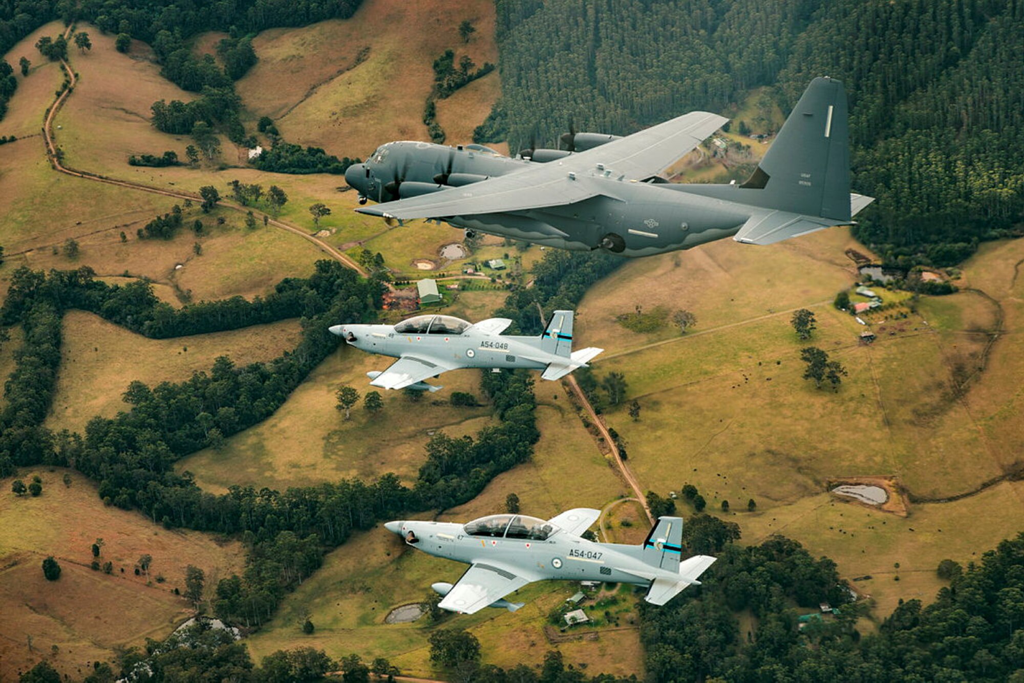 Two RAAF PC-21 aircraft conduct sorties over the Newcastle region with the US Air Force AC-130J Ghostrider from 17th Special Operations Squadron. Photo by Leading Aircraftman Samuel Miller.