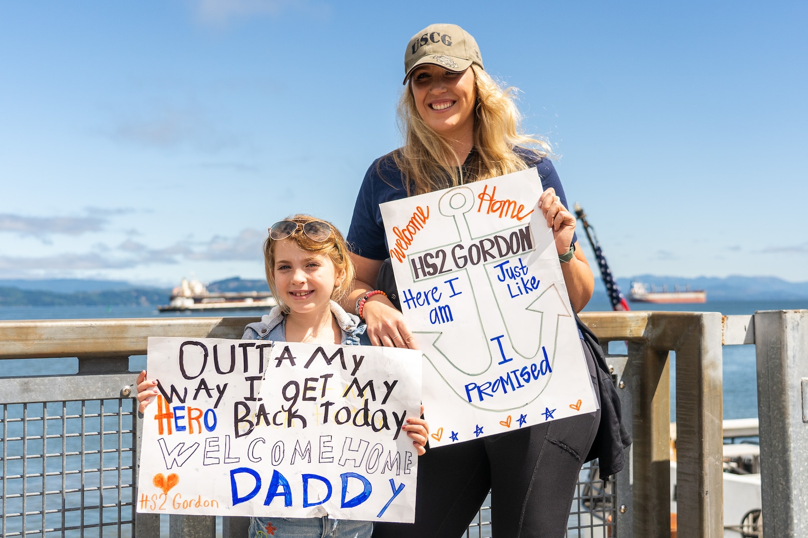 Families greet the crew of USCGC Steadfast as they return to the cutter’s homeport in Astoria, Oregon, following a patrol July 21, 2023. Steadfast is a 210-foot reliance class cutter. (U.S. Coast Guard photo by Petty Officer 1st Class Travis Magee)