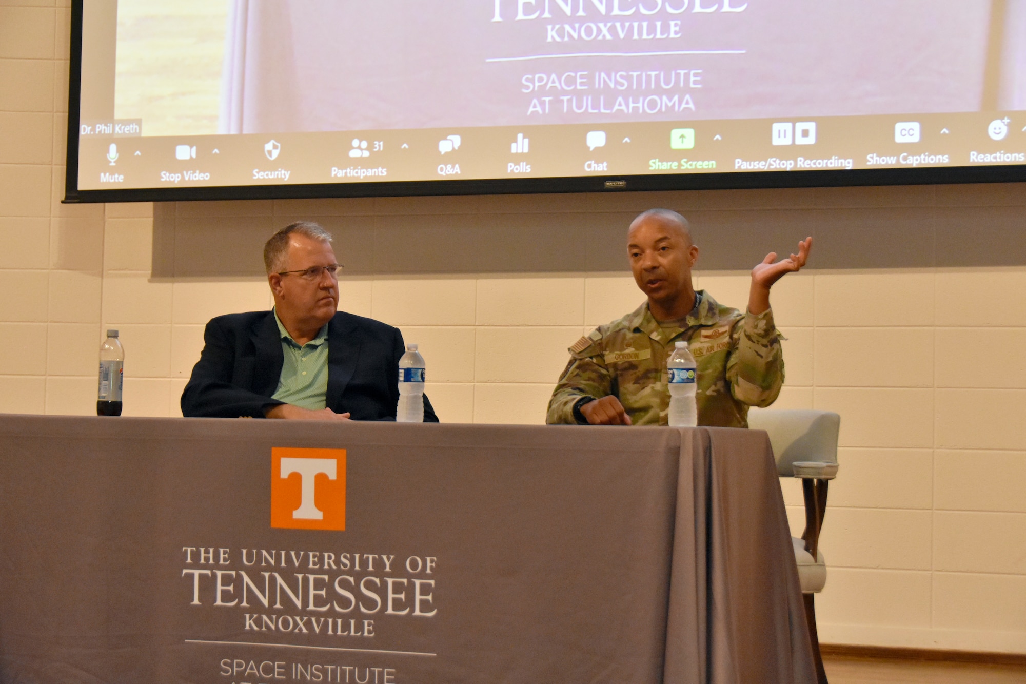 Col. Randel Gordon, Arnold Engineering Development Complex commander, right, and Dr. John Schmisseur, University of Tennessee Space Institute executive director, discuss the state of the aerospace and defense industries and workforce needs during a July 13, 2023, event at UTSI hosted by the Tennessee Section of the American Institute of Aeronautics and Astronautics. (U.S. Air Force photo by Bradley Hicks)