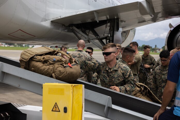 U.S. Marines with 2nd Battalion, 5th Marine Regiment, 1st Marine Division, unload gear to begin Marine Aviation Support Activity 23 at Puerto Princesa International Airport, Palawan, Philippines, July 12, 2023. MASA 23 is a bilateral exercise between the Armed Forces of the Philippines and the U.S. Marine Corps, aimed at enhancing interoperability and coordination in support of U.S.-Philippine mutual defense.