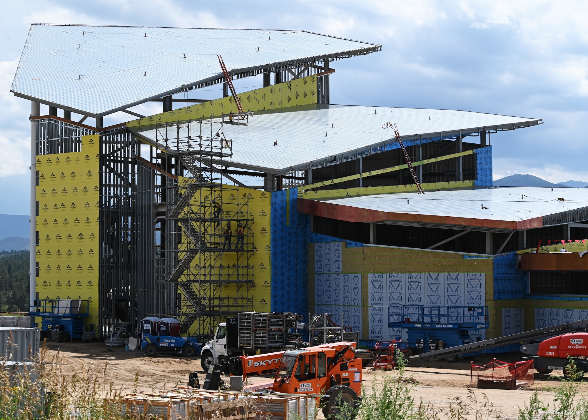 Contractors work on the steel structure of the U.S. Air Force Academy's Visitor Center, July 19, 2023.