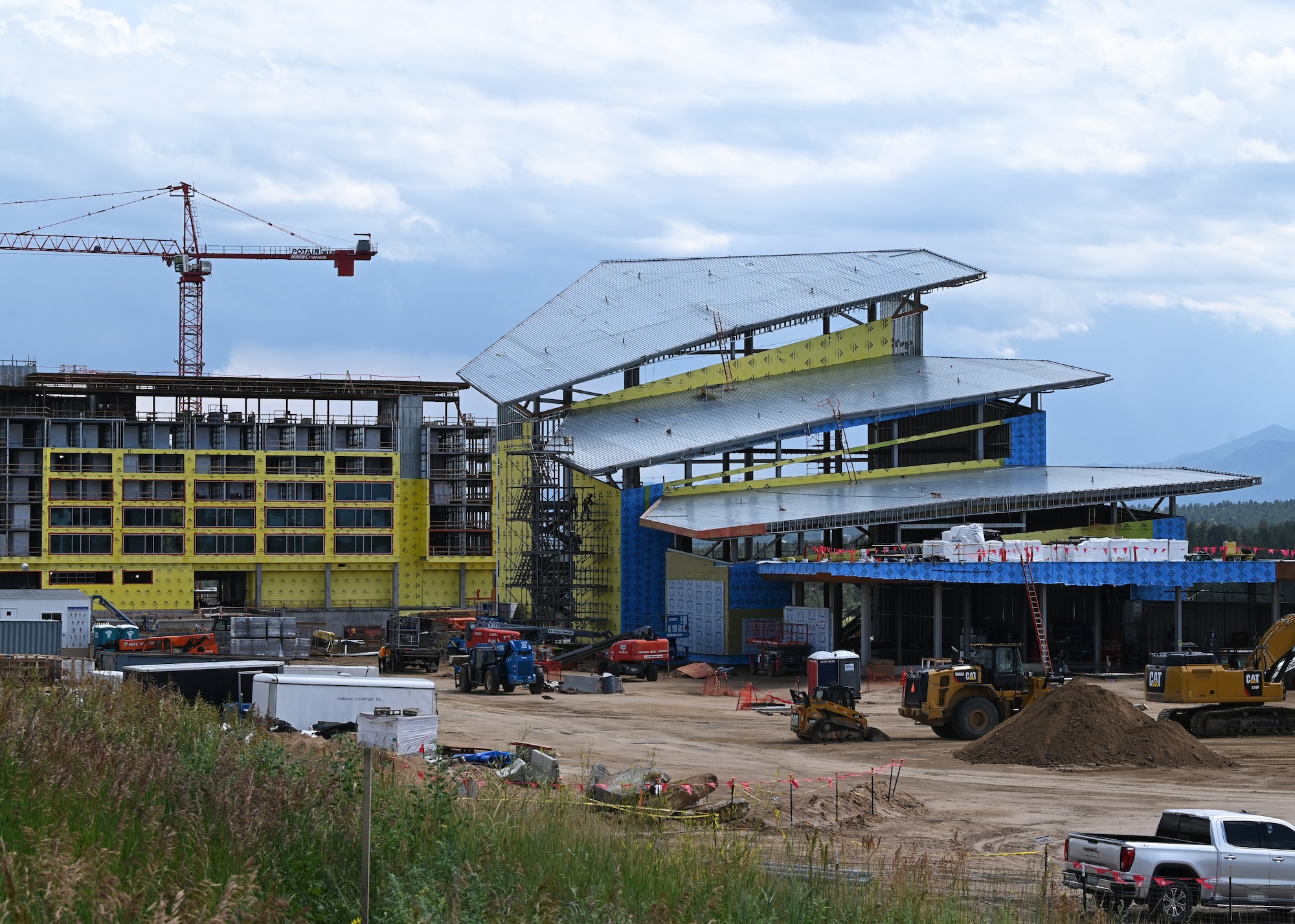 Contractors work on the steel structure of the U.S. Air Force Academy's Visitor Center, July 19, 2023.