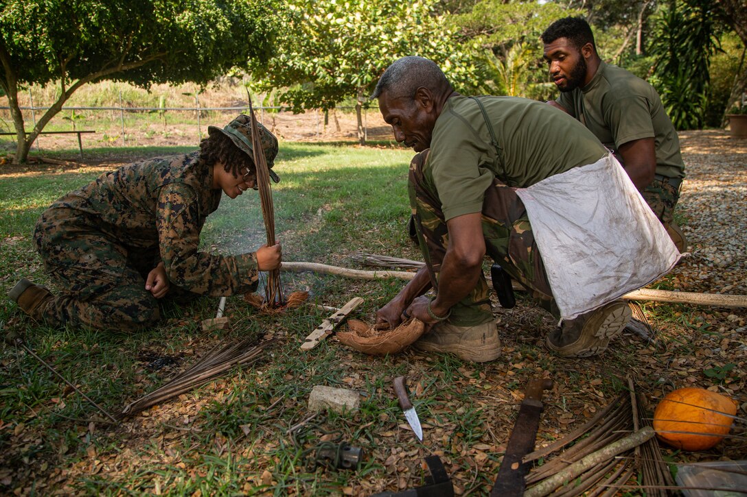 U.S. Marines and Sailors with Task Force Koa Moana 23 participated in a fire-starting class hosted by Papua New Guinea Defense Force Warrant Officer Class 2 Steven Baloiloi on Goldie River Training Camp, Port Moresby, Papua New Guinea, July 20, 2023. Task Force Koa Moana 23, composed of U.S. Marines and Sailors from I Marine Expeditionary Force, deployed to the Indo-Pacific to strengthen relationships with Pacific Island partners through bilateral and multilateral security cooperation and community engagements. (U.S. Marine Corps photo by Lance Cpl. Ricardo Ramirez)