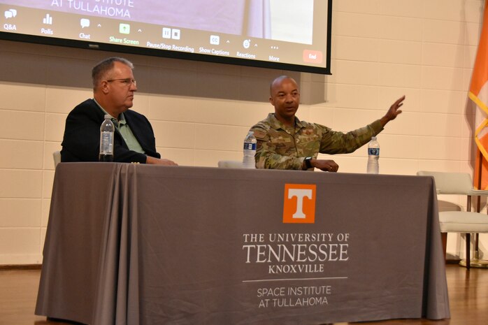 Col. Randel Gordon, Arnold Engineering Development Complex commander, right, and Dr. John Schmisseur, University of Tennessee Space Institute executive director, discuss the state of the aerospace and defense industries and workforce needs during a July 13, 2023, event at UTSI hosted by the Tennessee Section of the American Institute of Aeronautics and Astronautics. (U.S. Air Force photo by Bradley Hicks)