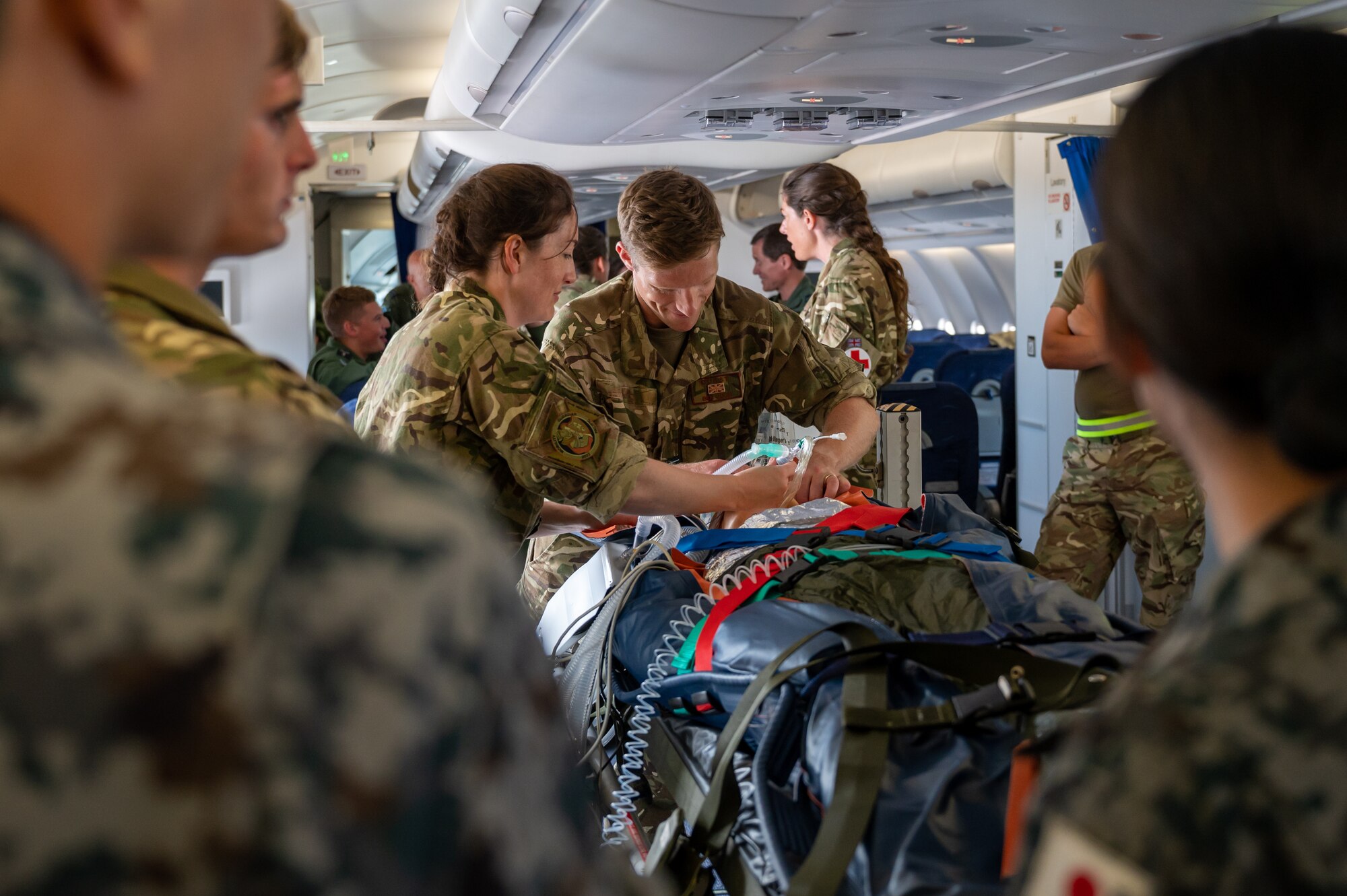 United Kingdom Royal Air Force Squadron leader Ben Pugh, aeromedical crewmember prepares a manikin for a bag valve mask during Mobility Guardian 2023 July 18th, 2023, at Yokota Air Base, Japan. A multilateral endeavor, MG23 features seven participating countries - Australia, Canada, France, Japan, New Zealand, United Kingdom, and the United States - operating approximately 70 mobility aircraft across multiple locations spanning a 3,000 mile exercise area from July 5th through July 21. Our Allies and partners are one of our greatest strengths and a key strategic advantage. (U.S. Air Force photo by Senior Airman Zachary Willis)