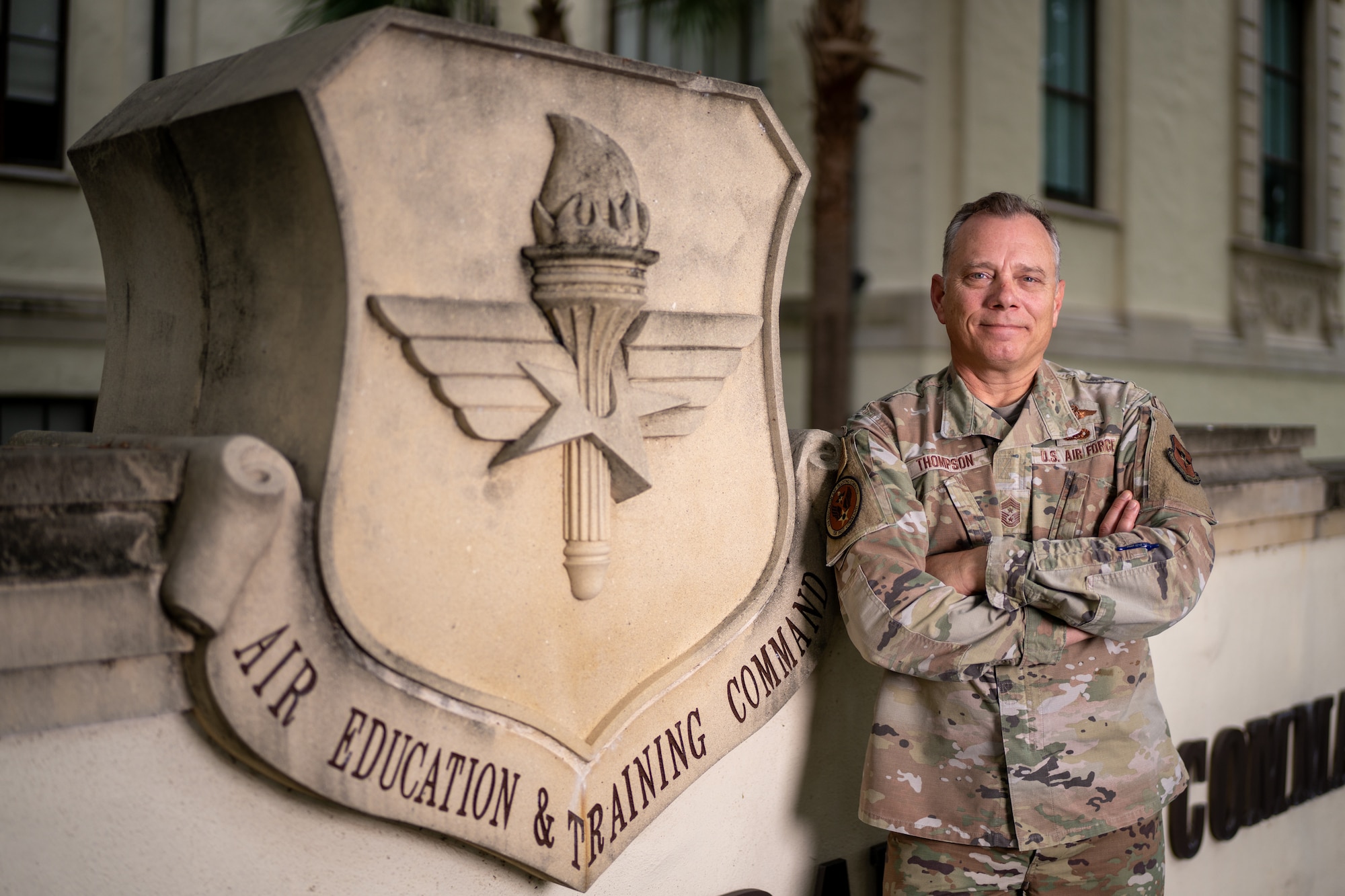 US. Air Force Chief Master Sgt. Erik Thompson, command chief of Air Education and Training Command poses for a photo near the AETC headquarters building