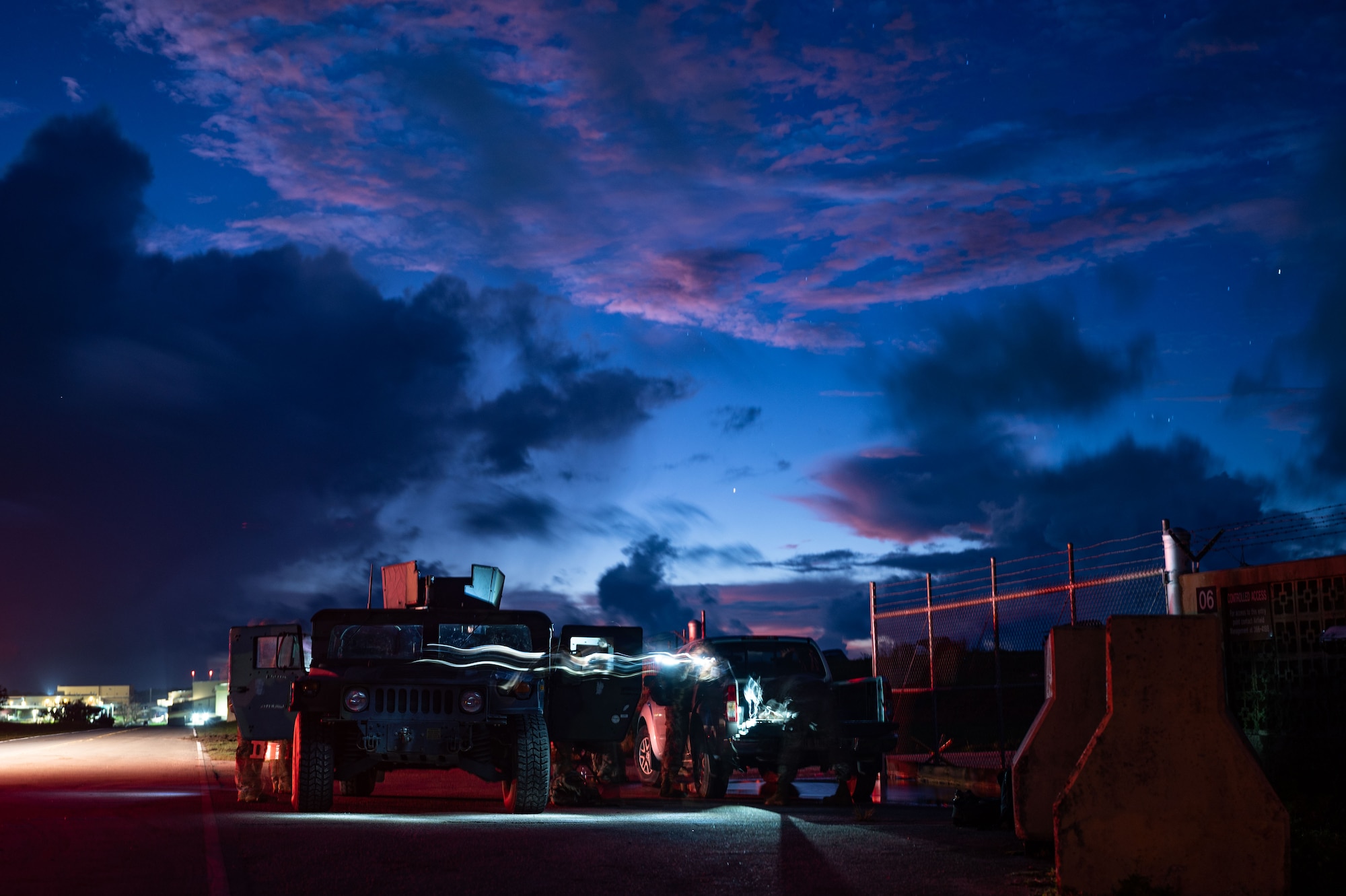U.S. Contingency Response Airmen prepare to open the airfield on Andersen Air Force, Guam, during Mobility Guardian 23. In this exercise, CR Airmen rapidly deploy personnel and quickly established an airbase. This capability allows U.S. forces, Allies and partners to be agile and respond to real world needs whenever and wherever necessary. MG23 is a mobility exercise held across a 3,000-mile area intended to deepen interoperability with U.S. allies and partners, bolstering the collective ability to support a free and open Indo-Pacific area. (U.S. Air Force photo by Staff Sgt. Bailee Ann Darbasie)