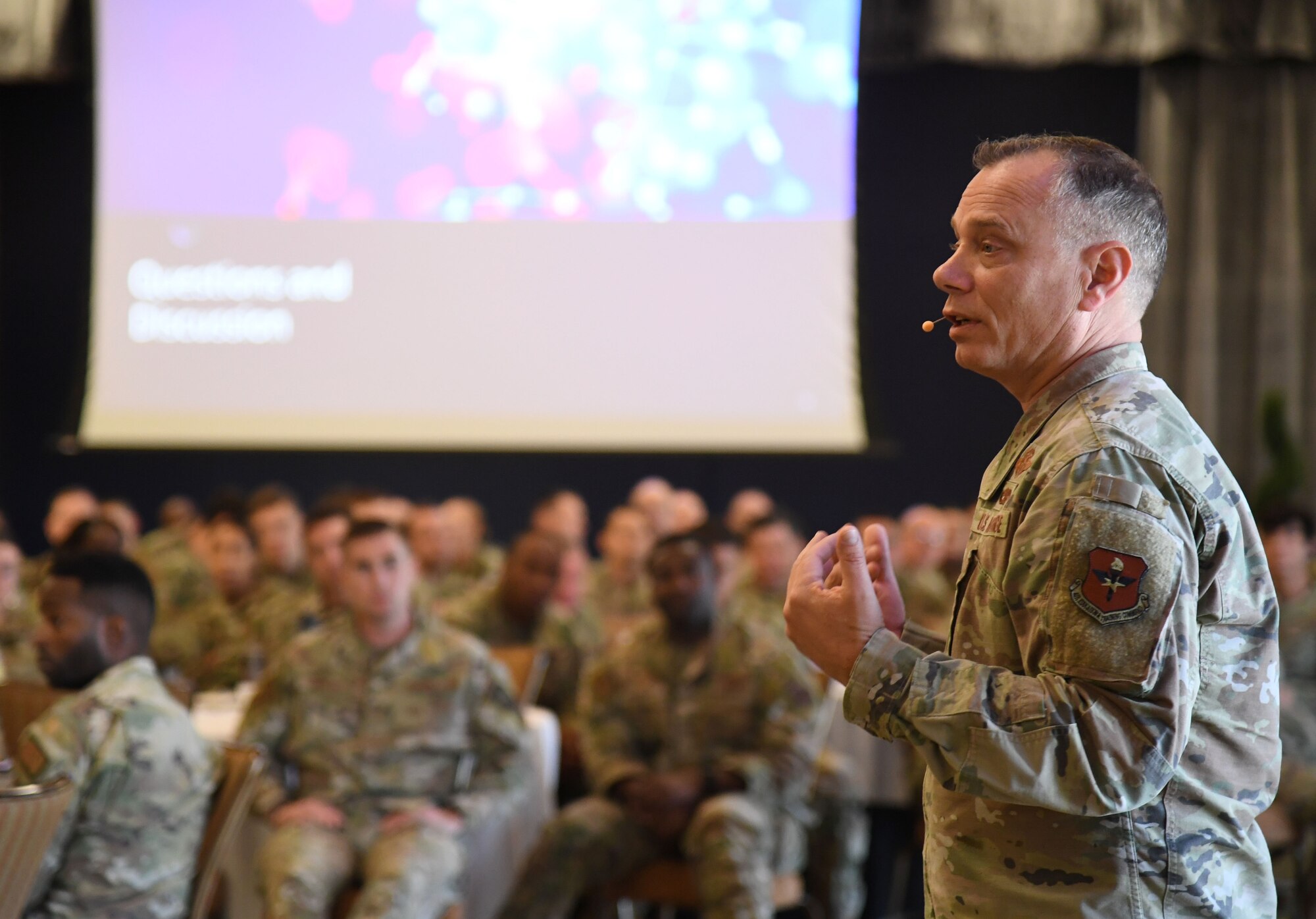U.S. Air Force Chief Master Sgt. Erik Thompson, command chief of Air Education and Training Command, speaks with Airman from AETC and Air Force Special Operations Command , during the inaugural Torch and Dagger professional development seminar at Keesler Air Force Base, Mississippi, October 15, 2022