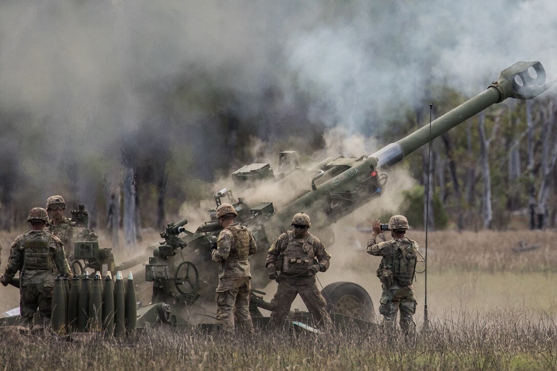 U.S. Army Soldiers with the 2nd Battalion, 11th Field Artillery Regiment, 25th Infantry Division fire a M-777A2 Towed Howitzer during a combined joint live-fire demonstration at Shoalwater Bay Training Area, in Queensland, Australia, July 22, 2023.