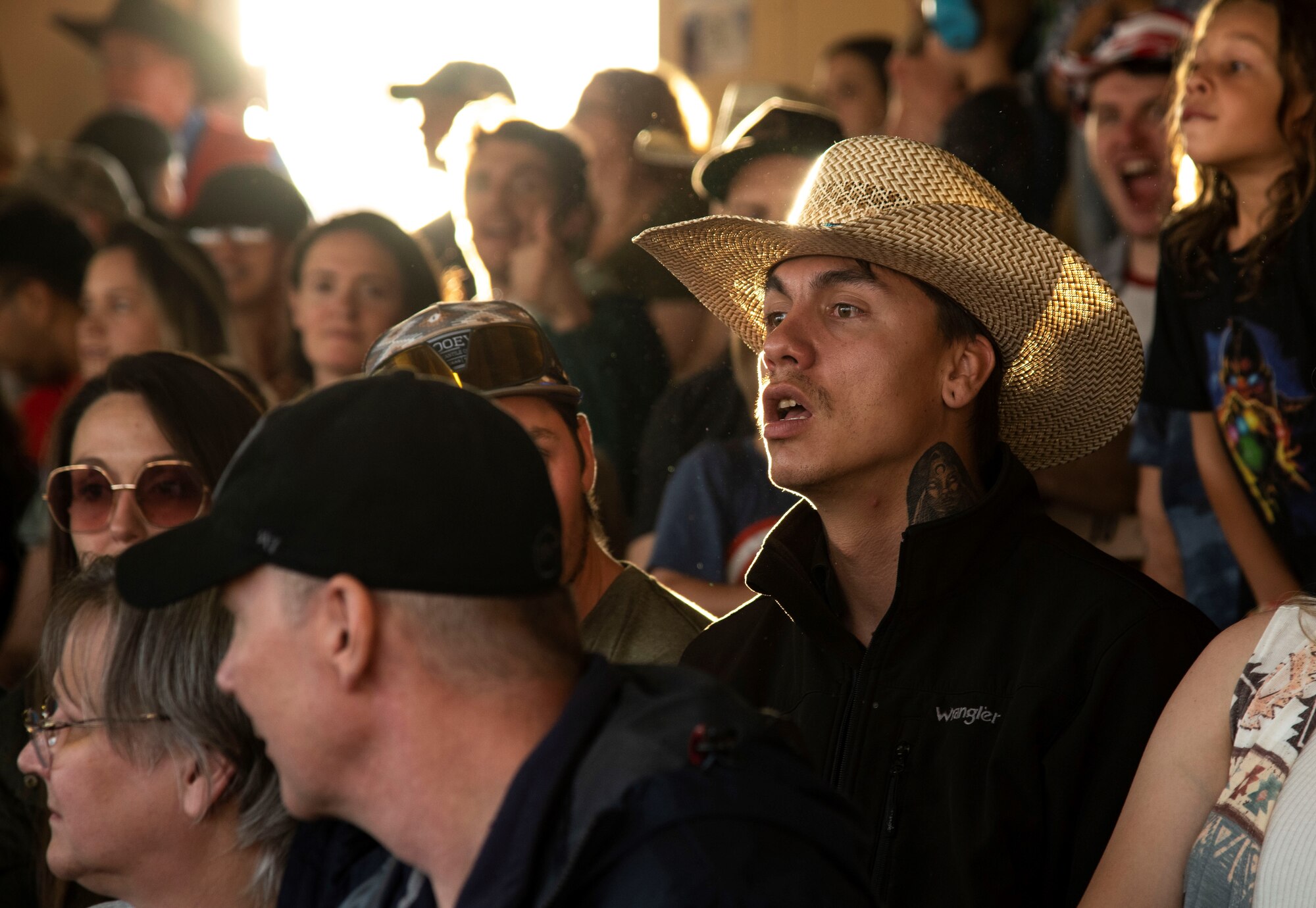 fans watching rodeo