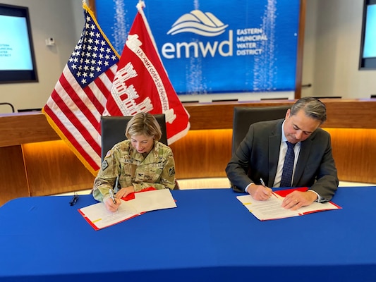 U.S. Army Corps of Engineers Los Angeles District commander Col. Julie Balten, left, and Joe Mouawad, Eastern Municipal Water District general manager, right, reaffirm their partnership and formally recognize the next phase of project implementation for the South Perris Desalination Program during a July 7 visit to the EMWD facility in Perris, California.
