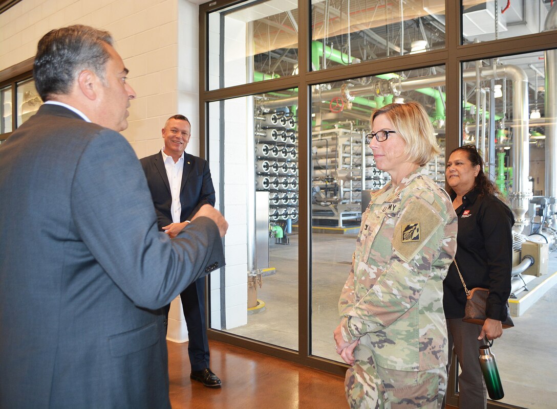 Joe Mouawad, general manager of the Eastern Municipal Water District, left, explains the process of the desalination program to Col. Julie Balten, LA District commander, second from right, during July 7 tour of the Perris II Desalter facility in Menifee, California.