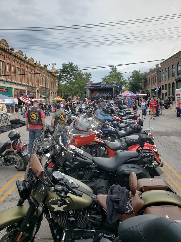 Members of the Chapter 30-1 Combat Veterans Motorcycle Association walk around downtown Rapid City, South Dakota. The association raises money for veteran organizations through events such as poker runs, pub crawls, holiday breakfasts, chuck-a-puck, and bake sales. (Courtesy photo)