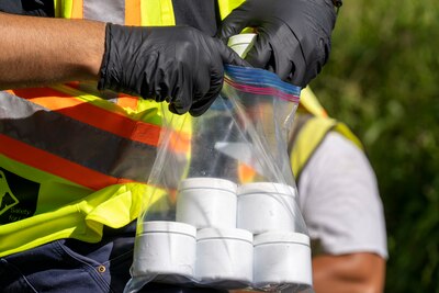 A Naval Facilities Engineering Systems Command (NAVFAC) contractor preps soil samples for transportation to laboratories for testing as part of NAVFAC Public Works Department and Joint Task Force-Red Hill’s (JTF-RH) hazard material spill recovery operation at the Red Hill Bulk Fuel Storage Facility (RHBFSF) in Halawa, Hawaii, Dec. 2, 2022. Remediation of the spill site through excavation and removal of contaminated surfaces and material was immediately initiated after an estimated 1,100 gallons of aqueous film forming foam (AFFF) concentrate spilled from the fire suppression system at RHBFSF Adit 6 on Nov. 29, 2022. JTF-RH was established by the Department of Defense to ensure the safe and expeditious defueling of the RHBFSF. (U.S. Air National Guard photo by Staff Sgt. Orlando Corpuz)