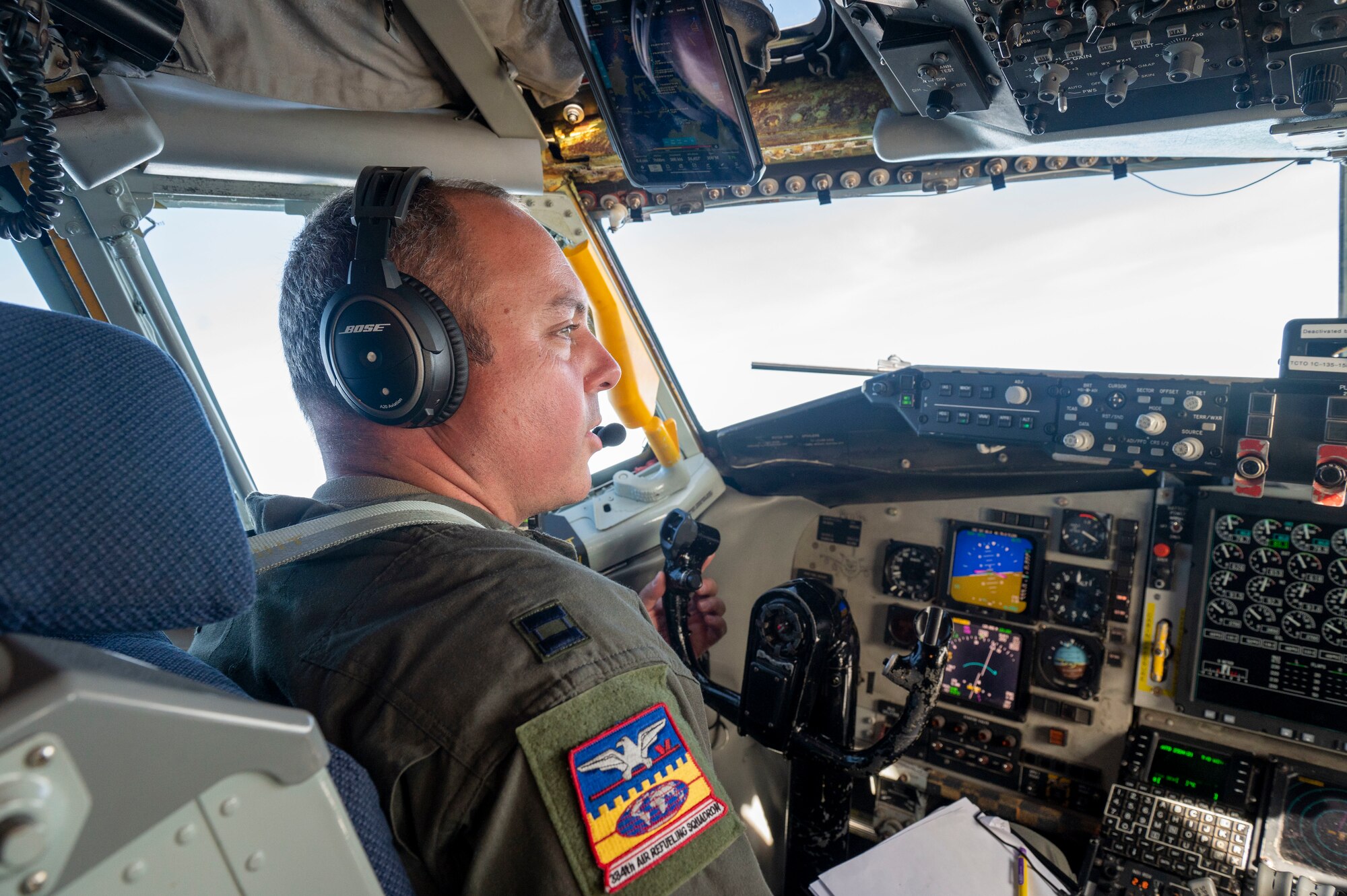 U.S. Air Force Capt. Philip Campbell, 384th Aerial Refueling Squadron KC-135 Stratotanker pilot, operates a KC-135, assigned to the 92nd Aerial Refueling Wing, during Mobility Guardian 23 over the Indo-Pacific region July 14, 2023. 3,000 personnel directly supported the large-scale mobility exercise, which provided the maneuver of more than 15,000 U.S. and international forces associated with other exercises across the Indo-Pacific held in the same timeframe. (U.S. Air Force photo by Tech. Sgt. Heather Clements)