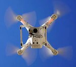 A Small Unmanned Aircraft Systems also known as a drone flies above the skies of Texas