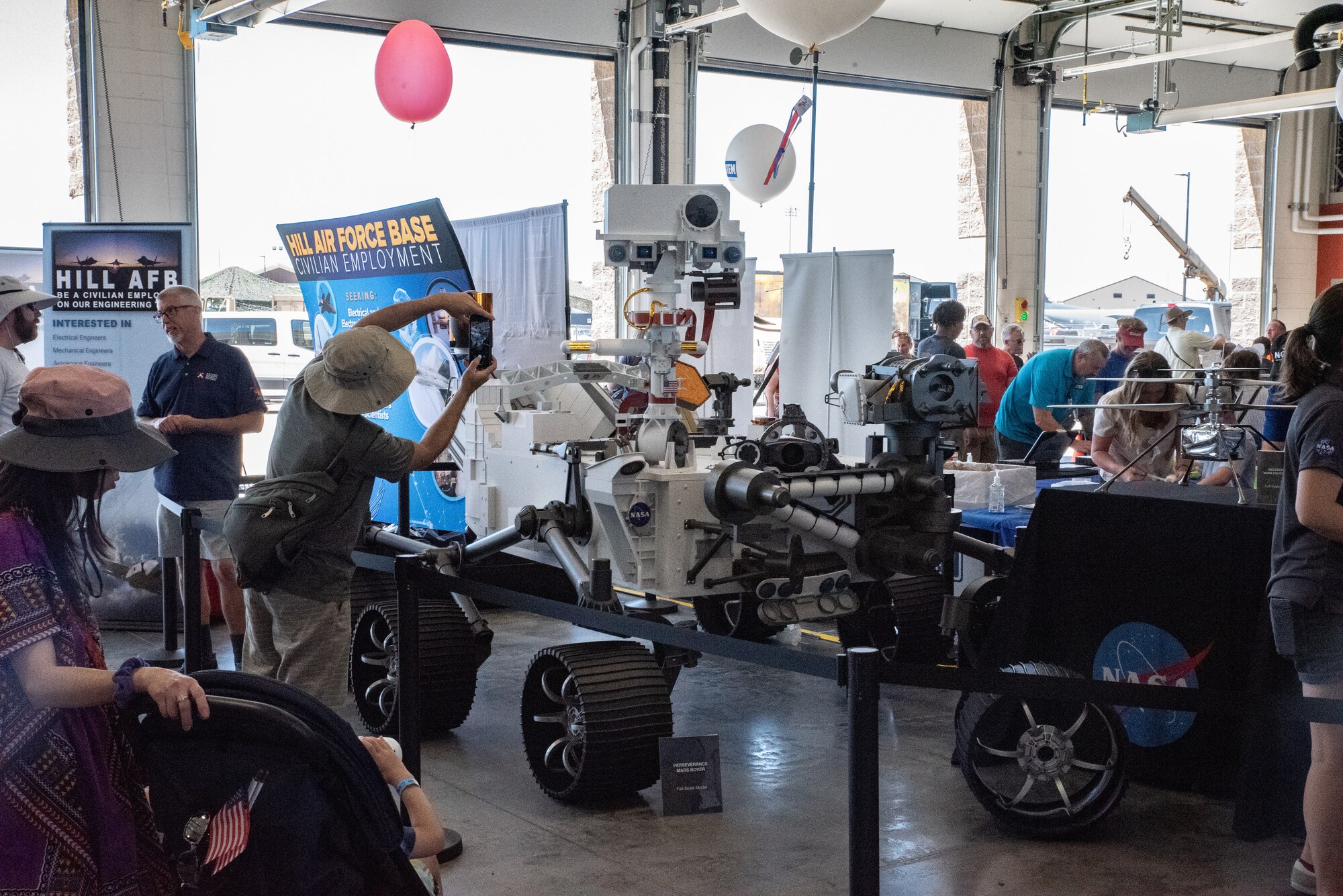 People looking inside the STEM hangar