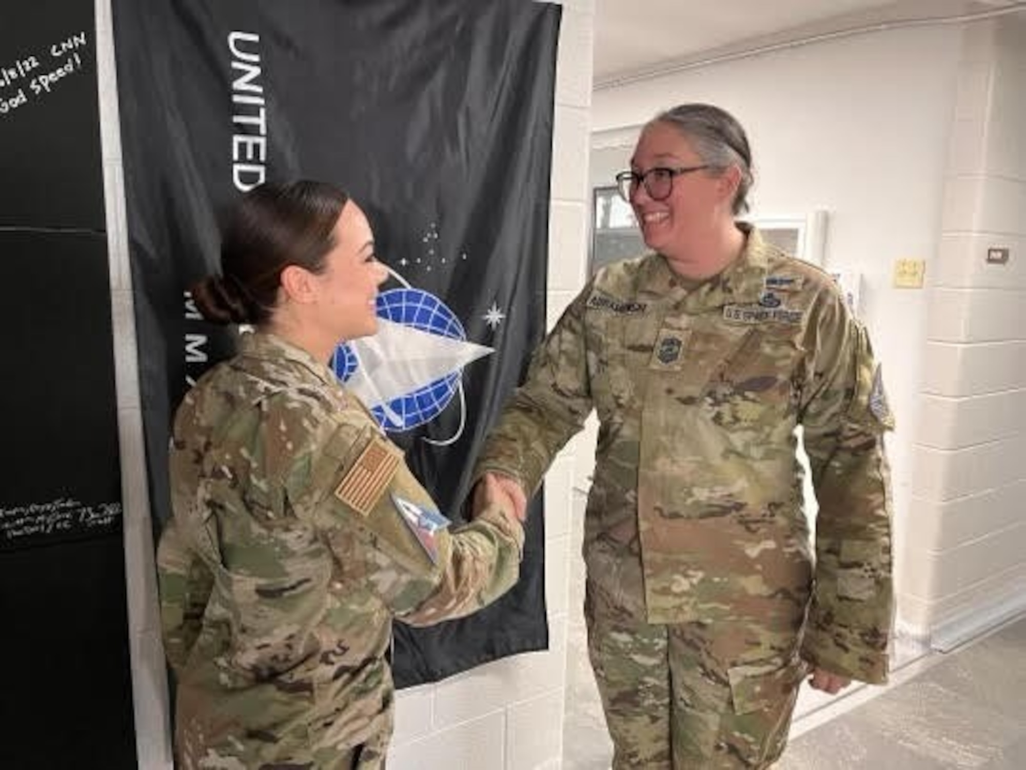 a person shakes hands with another