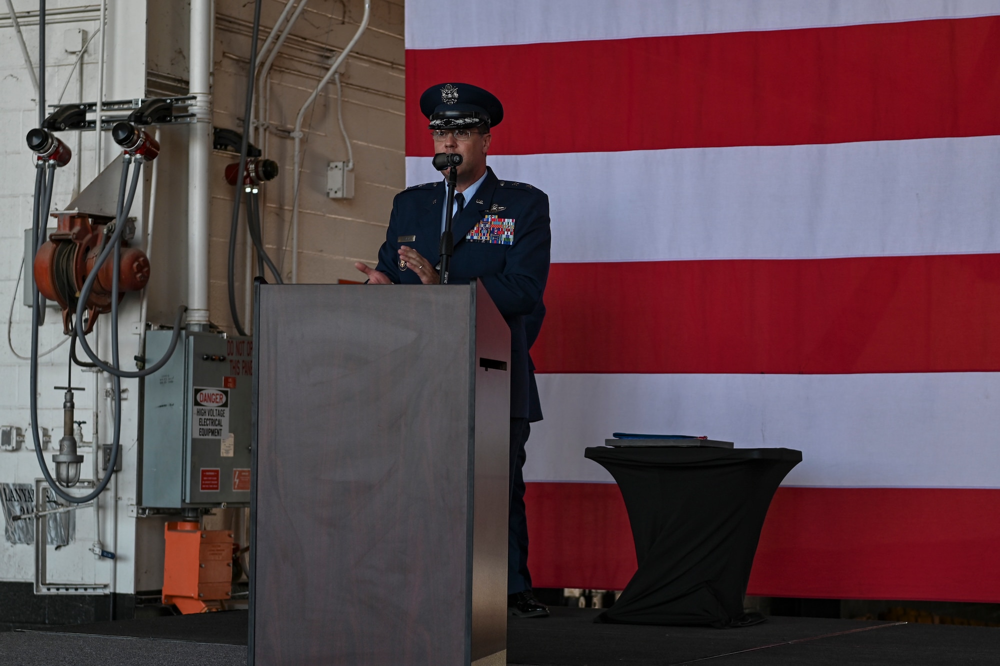 U.S. Air Force Maj. Gen. Andrew Gebara, 8th Air Force and J-GSOC commander, delivers remarks during the 7th Bomb Wing change of command ceremony inside the Three Bay Hangar at Dyess Air Force Base, Texas, July 24, 2023. The ceremony symbolizes the transfer of authority between one commander to another. Spanier took command of the 7th BW from Col. Joseph Kramer. (U.S. Air Force photo by Airman 1st Class Emma Anderson)