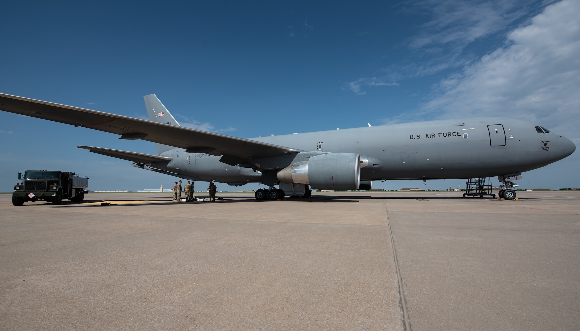 Airmen assigned to the 22nd Logistic Readiness Squadron prepare to connect a Versatile Integrating Partner Equipment Refueling (VIPER) kit to a fuel truck and KC-46A Pegasus July 13, 2023, at McConnell Air Force Base, Kansas. VIPER kits have the ability to conduct hot pit refueling of aircraft with any fuel infrastructure, making them a part of the Agile Combat Employment (ACE) construct. (U.S. Air Force photo by Staff Sgt. Tryphena Mayhugh)