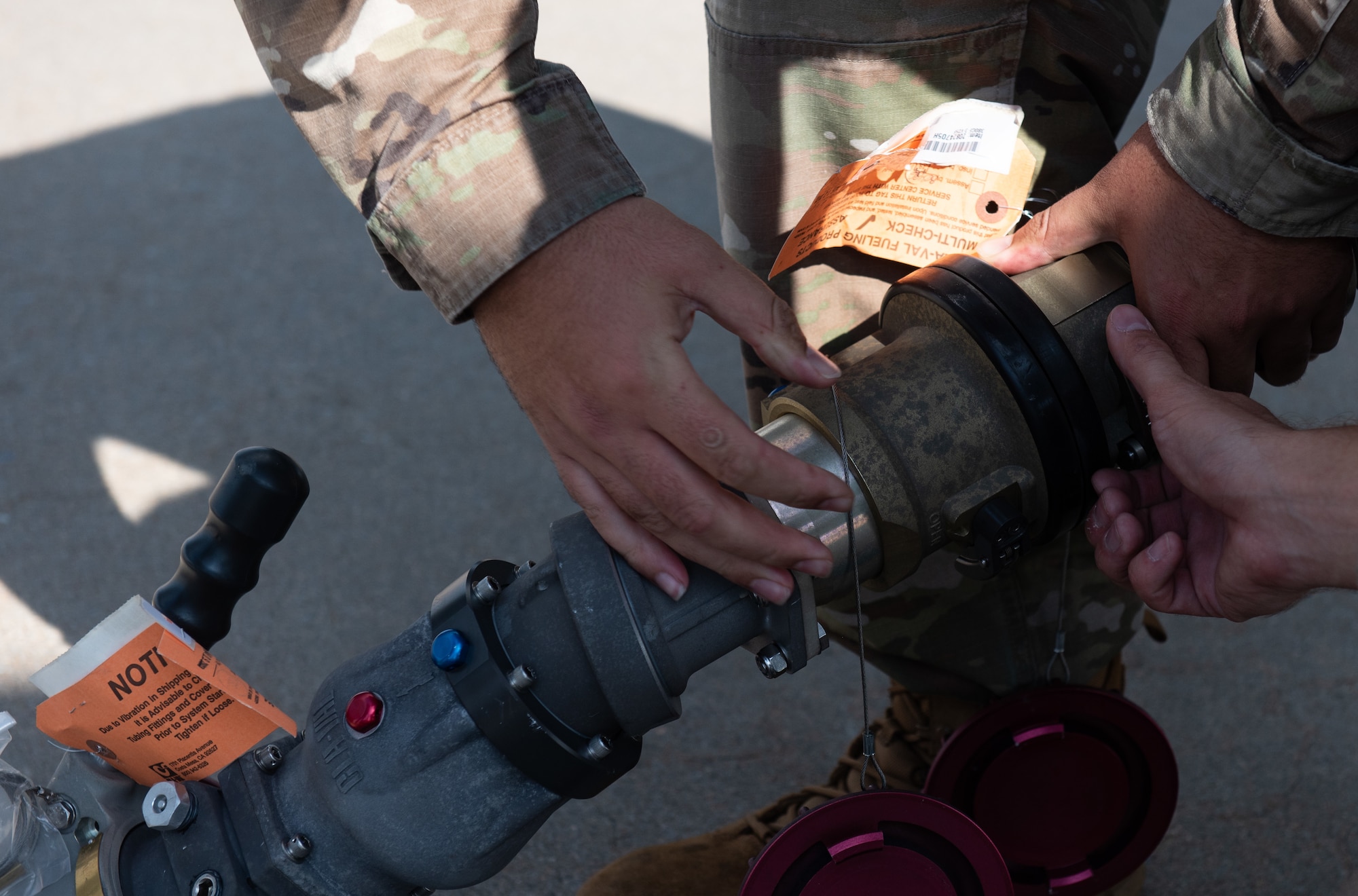 enior Airman Felix Cruz, 22nd Logistic Readiness Squadron fuels lab technician, left, and Tech. Sgt. Cody Post, 22nd LRS noncommissioned officer in charge of fuels distribution, connect a part to a fuel hose July 13, 2023, at McConnell Air Force Base, Kansas. Cruz, Post and other 22nd LRS Airmen hooked the truck up to a Versatile Integrating Partner Equipment Refueling (VIPER) kit, which can be used to fuel any aircraft in the world. (U.S. Air Force photo by Staff Sgt. Tryphena Mayhugh)