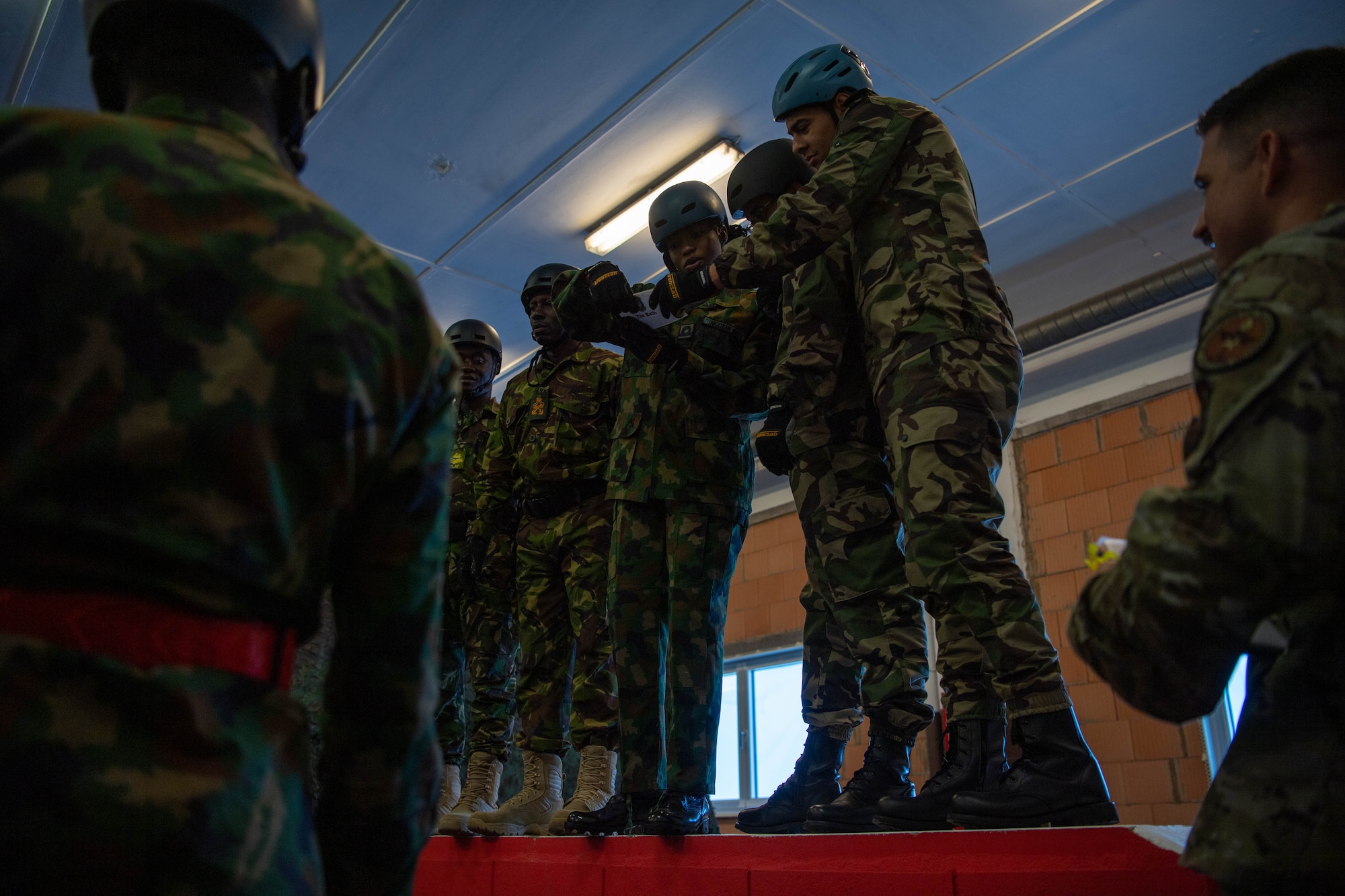 Nigerian Navy Sub-Lieutenant Felicia Ene Odunayo, Inter-African Professional Development Seminar student, goes over obstacle instructions during a team building exercise at Kapaun Air Station, Germany, July 19, 2023.