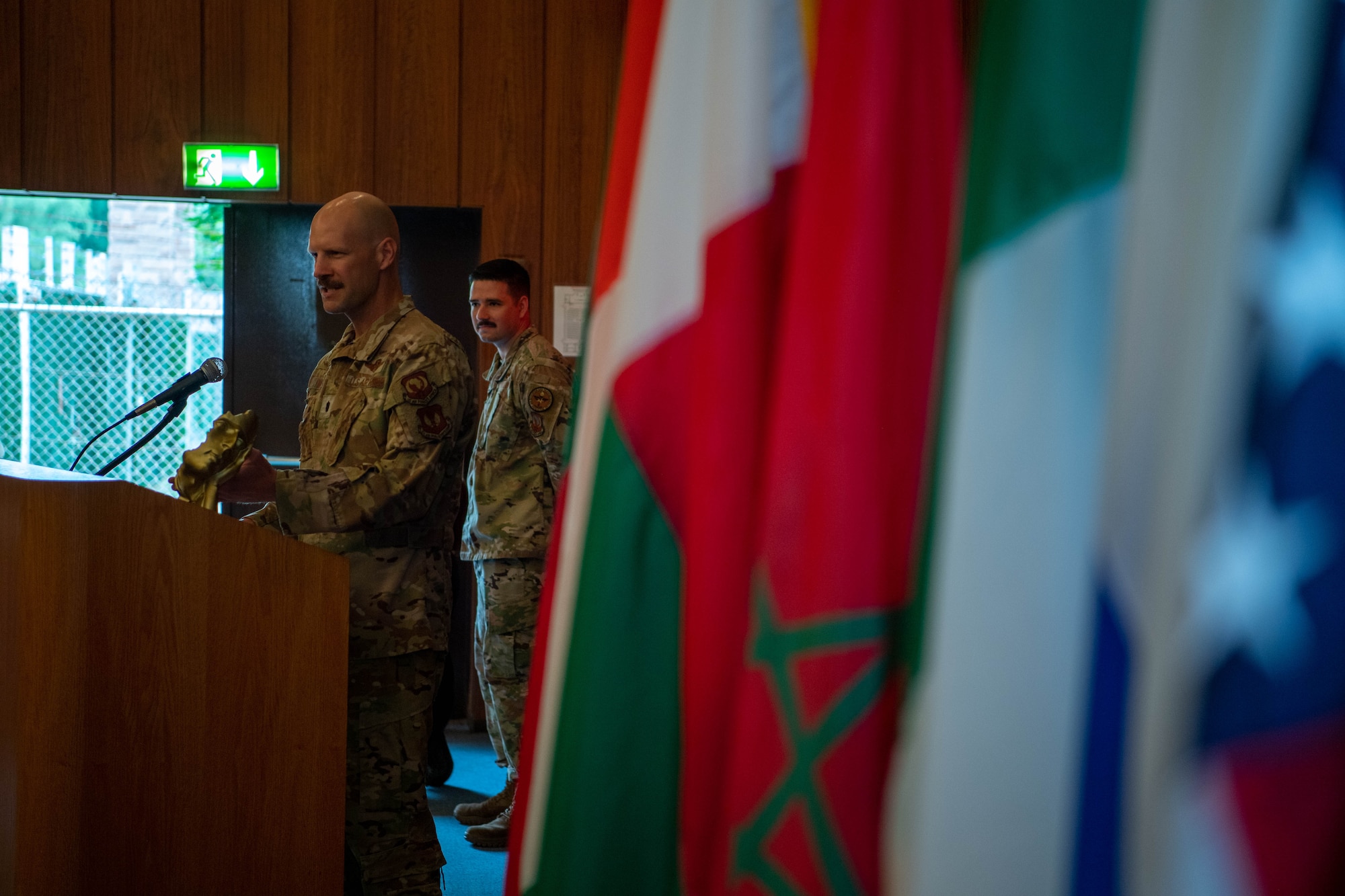 U.S. Air Force Lt. Col Matthew Mumm, Inter-European Air Forces Academy, Commandant, speaks to Inter-African Professional Development Seminar graduates at the Kirk Theatre, Einsiedlerhof Air Station, Germany, July 21, 2023.