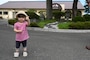 A child participant of a Misawa Friendship Tour gives a thumbs up outside of Lakeview Grille at Misawa Air Base, Japan, July 14, 2023.