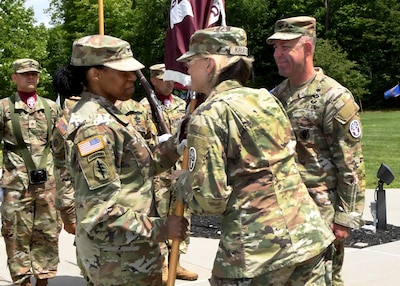 U.S. Army Col. Christina M. Buchner, the new commander of the U.S. Army Medical Department Activity, Fort Drum, receives the unit’s flag, or colors, from Brig. Gen. Mary V. Krueger, commanding general of Medical Readiness Command, East, during the MEDDAC’s change of command ceremony at Memorial Park, Fort Drum, N.Y., July 21, 2023.