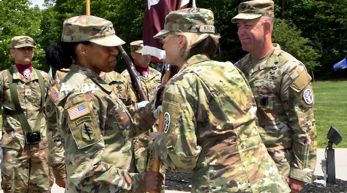 Col. Christina M. Buchner, the new commander of the U.S. Army Medical Department Activity, Fort Drum, receives the unit’s flag, or colors, from Brig. Gen. Mary V. Krueger, commanding general of Medical Readiness Command, East, during the MEDDAC’s change of command ceremony at Memorial Park, Fort Drum, N.Y., July 21, 2023.