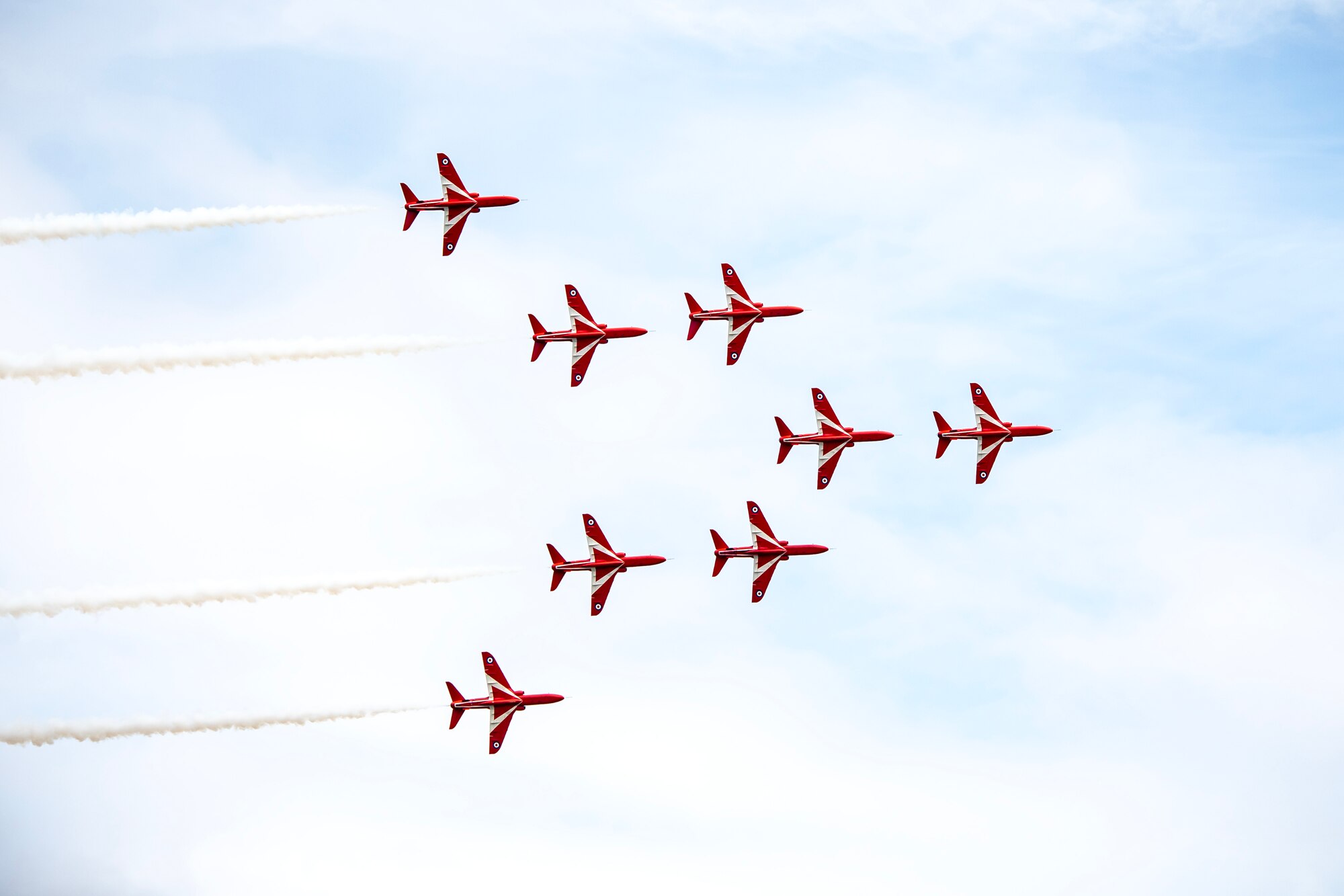 The Red Arrows, Royal Air Force Aerobatic team, conduct an aerial demonstration during the 2023 Royal International Air Tattoo at RAF Fairford, England, July 16, 2023. Throughout RIAT, several nations exhibited their air power and capabilities for thousands of spectators helping inspire the next generation of aviation. (U.S. Air Force photo by Staff Sgt. Eugene Oliver)