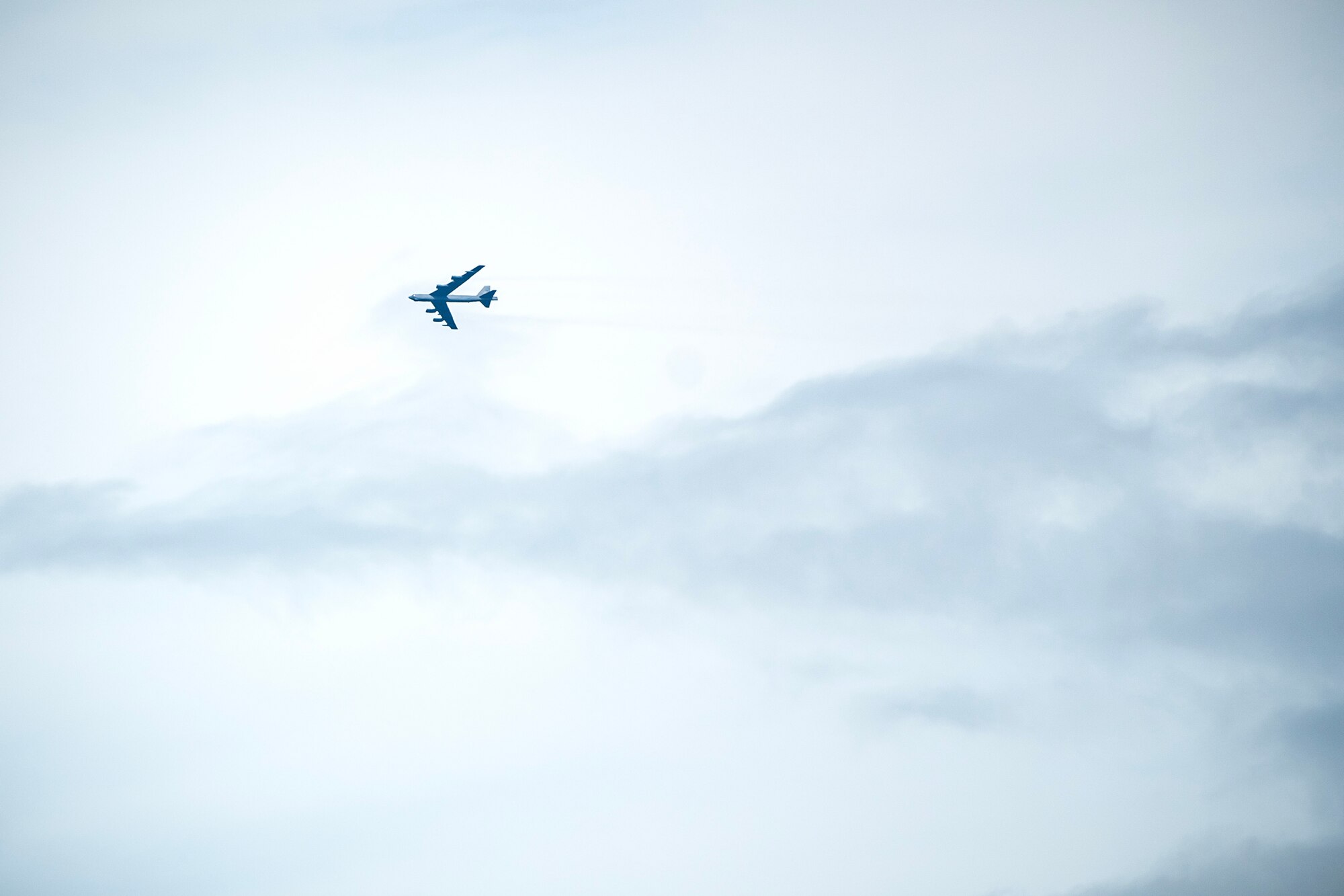 A B-52H Stratofortress aircraft flies overhead during the 2023 Royal International Air Tattoo at RAF Fairford, England, July 16, 2023. RIAT participation demonstrates U.S. commitment to European allies and partners while highlighting U.S. capabilities to a diverse audience, emphasizing unity, innovation, and a shared commitment to excellence. (U.S. Air Force photo by Staff Sgt. Eugene Oliver)