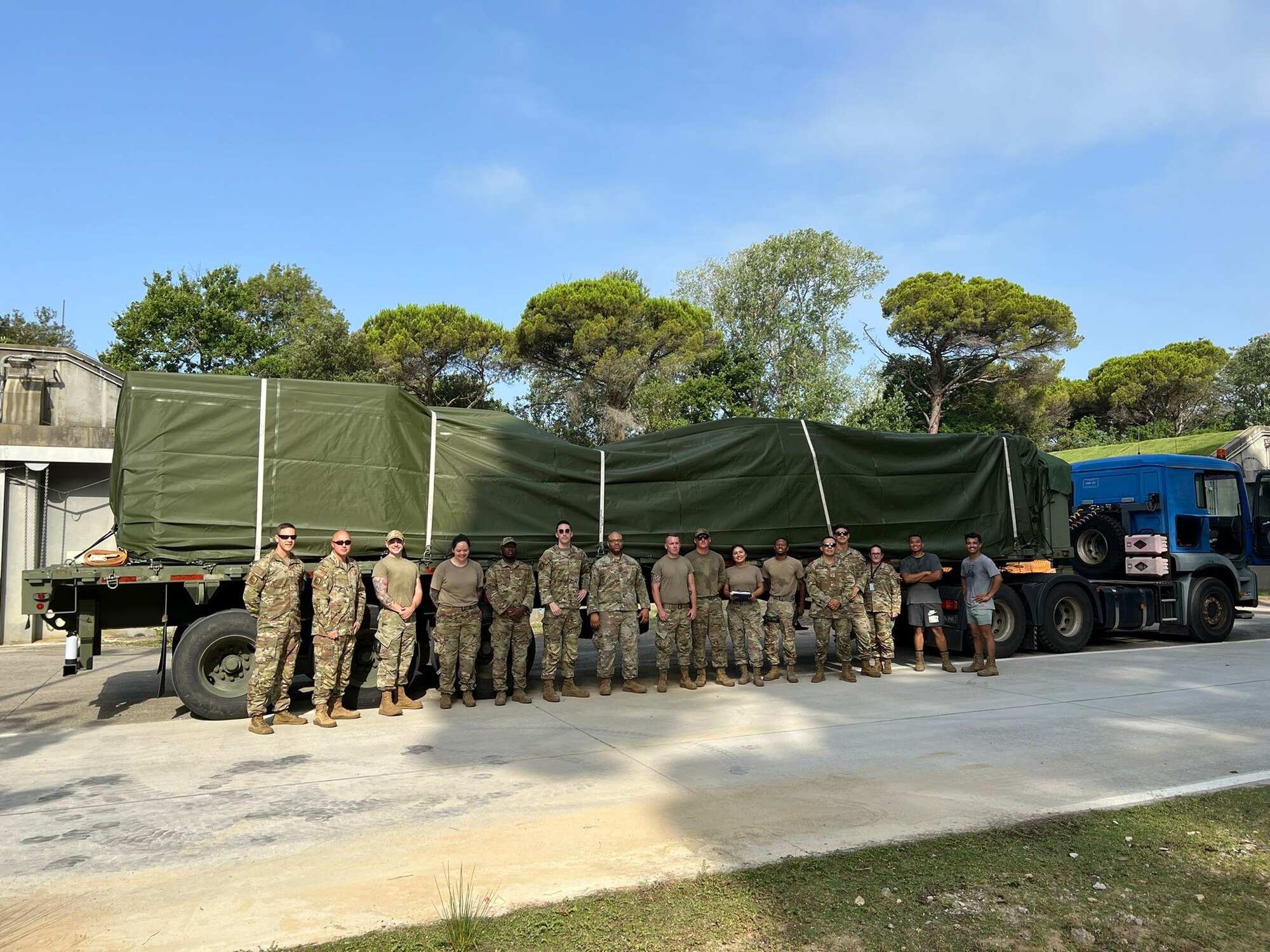 U.S Air Force Airmen assigned to the 731st Munitions Squadron pose for a group photo.