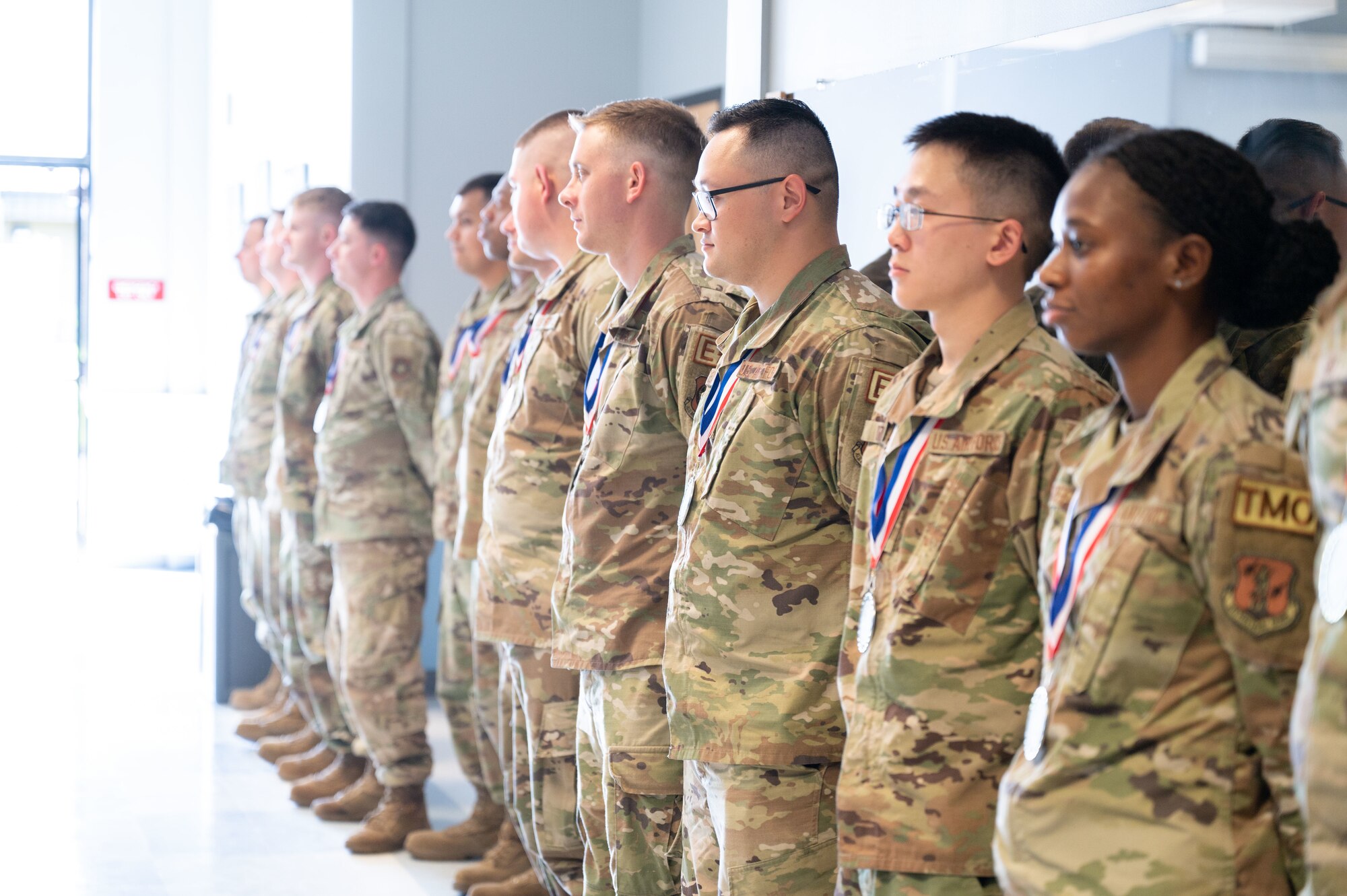 Airmen in Class 23-E1 are congratulated at the Airman Leadership School gratuation July 20, 2023 at Pease Air National Guard Base, New Hampshire. This was the first in-person ALS at Pease hosted by the 157th Air Refueling Wing. (U.S. Air National Guard photo by Tech. Sgt. Victoria Nelson)