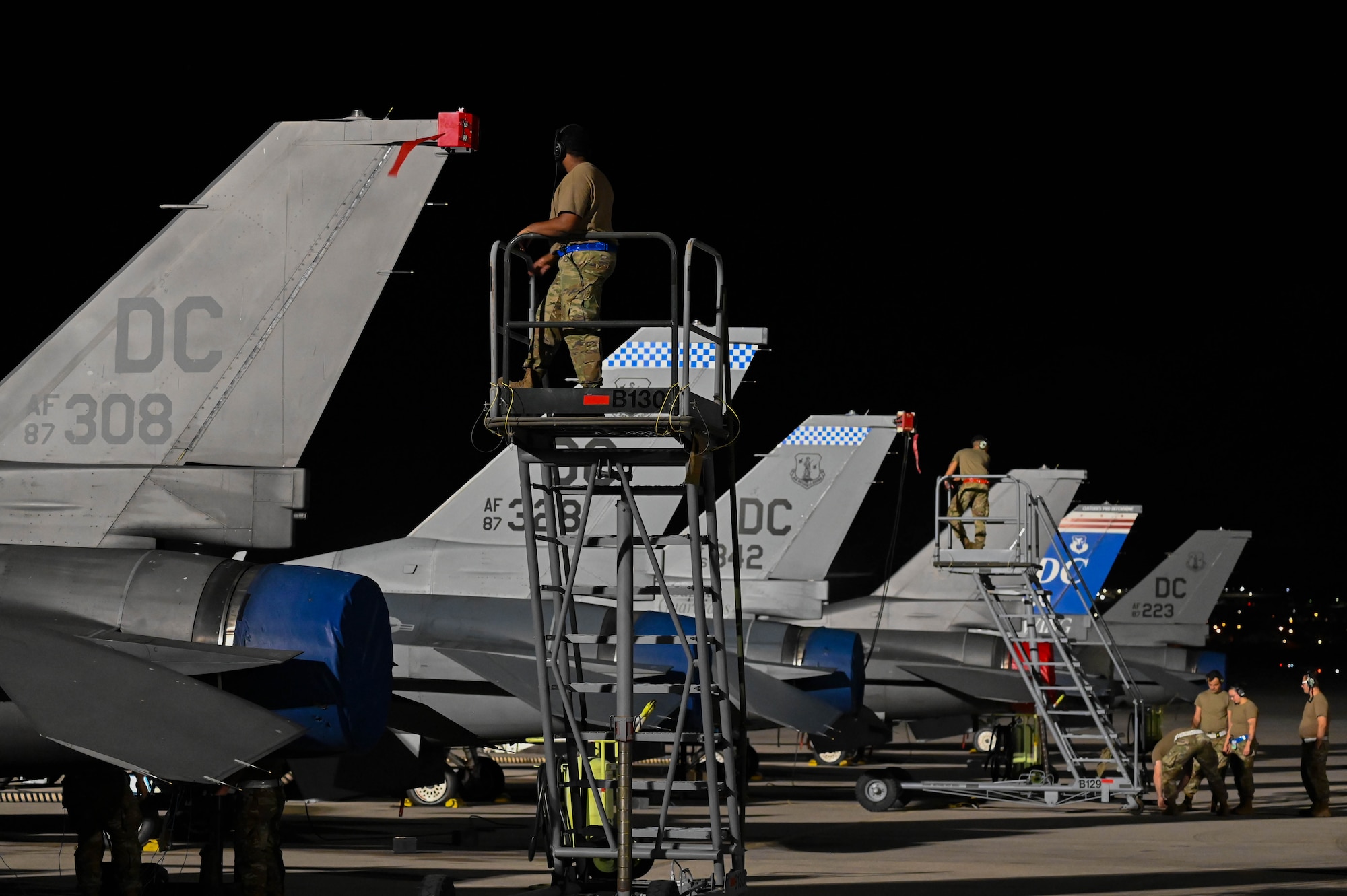 Airmen from the 87th Electronic Warfare Squadron assess the tail sensors of F-16 Fighting Falcons as part of COMBAT SHIELD during Red Flag 23-3 at Nellis Air Force Base, Nev., July 13, 2023. This Red Flag concentrated on three primary themes: defensive counter-air, offensive counter-air suppression of enemy air defenses, and offensive counter air-air interdiction. (U.S. Air Force photo by Capt. Benjamin Aronson)