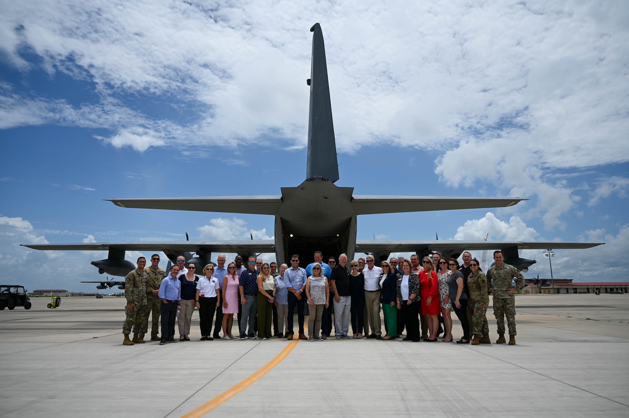 Air and Space Forces civic leaders pose for a group photo behind an HC-130J Combat King II aircraft at Patrick Space Force Base, Florida, July 20, 2023. The Air and Space Forces civic leaders are unpaid advisors, key communicators, and advocates for Department of the Air Force issues. (U.S. Space Force photo by Senior Airman Samuel Becker)